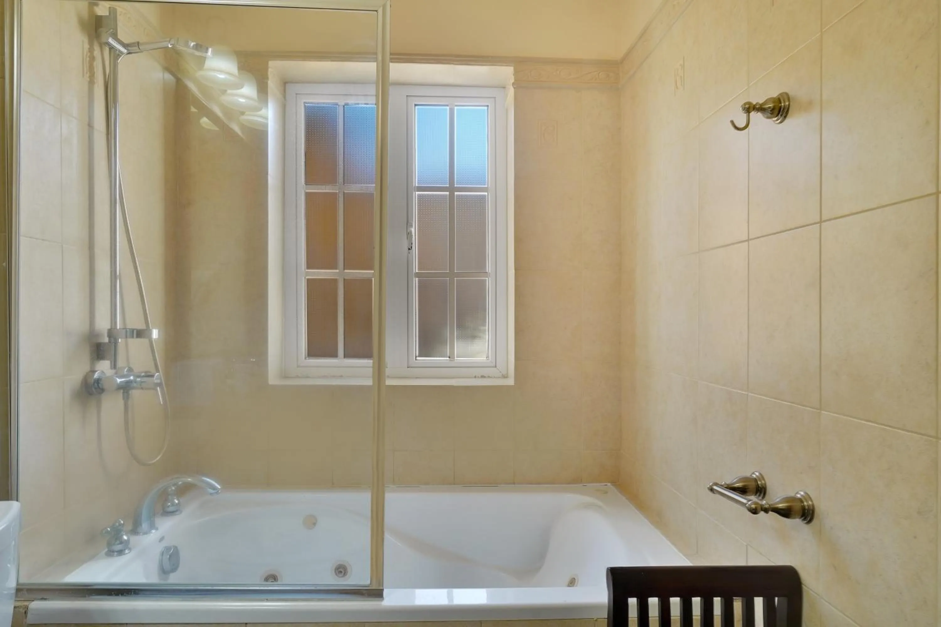 Shower in Mandela Court Suites Grenada