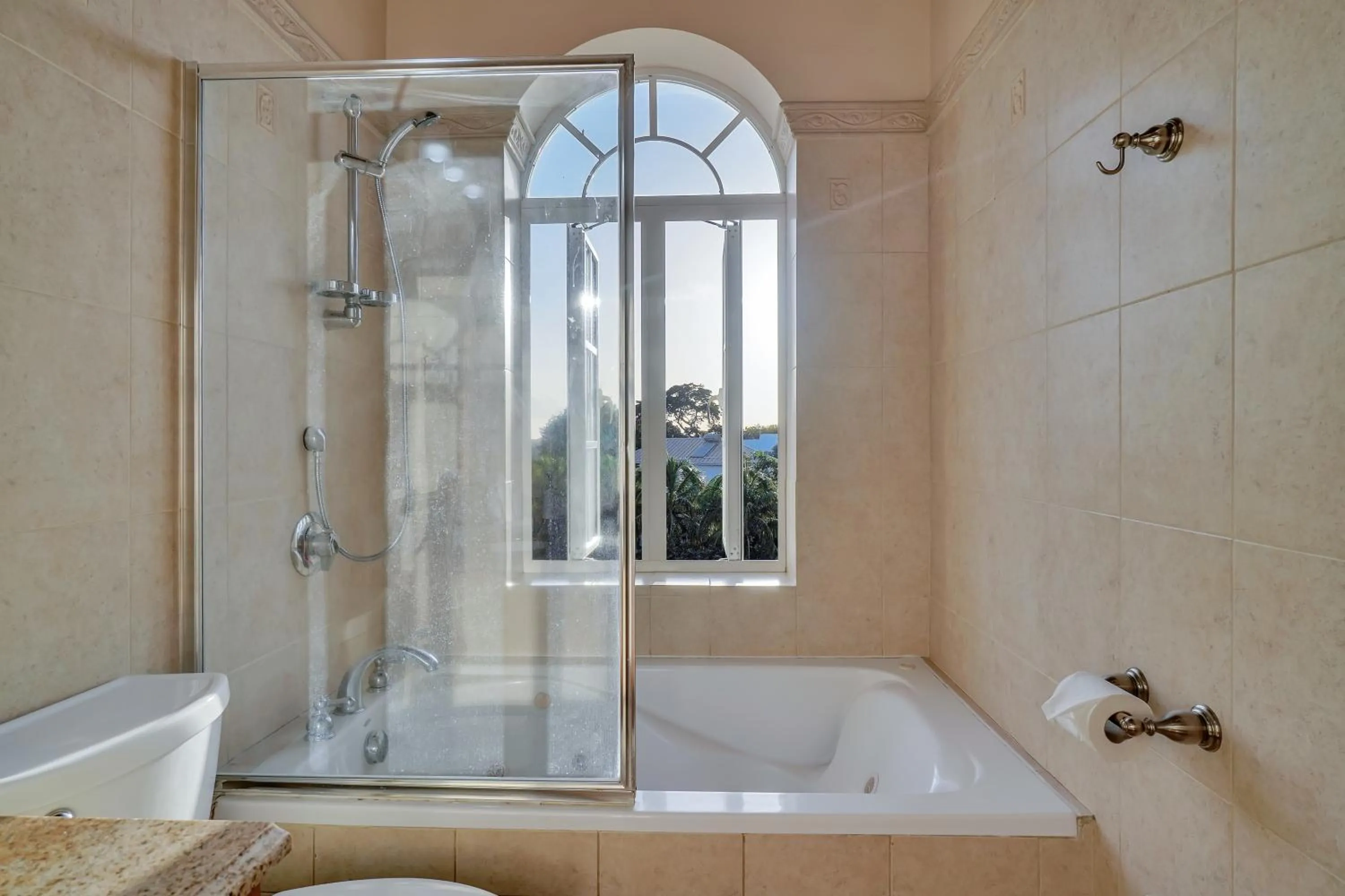 Shower in Mandela Court Suites Grenada