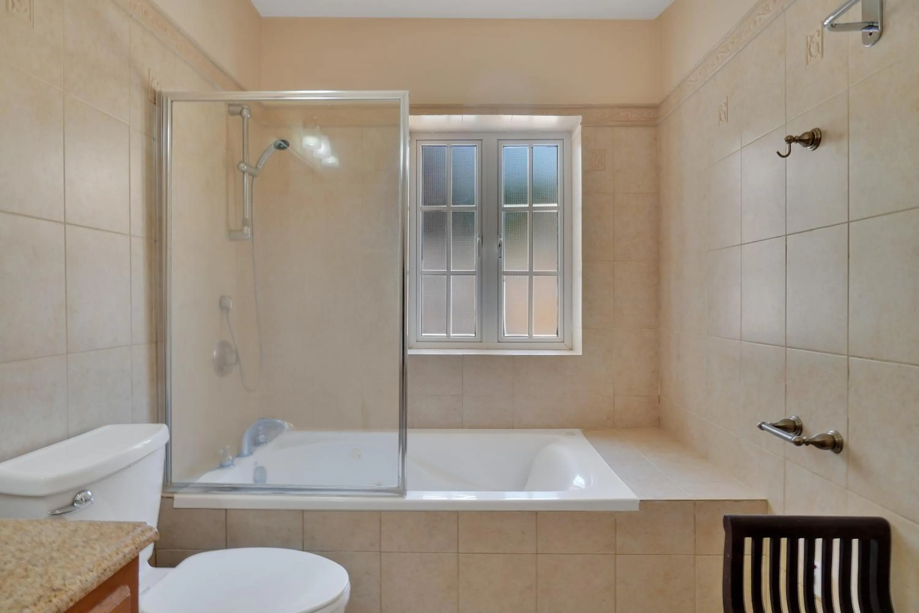 Shower in Mandela Court Suites Grenada