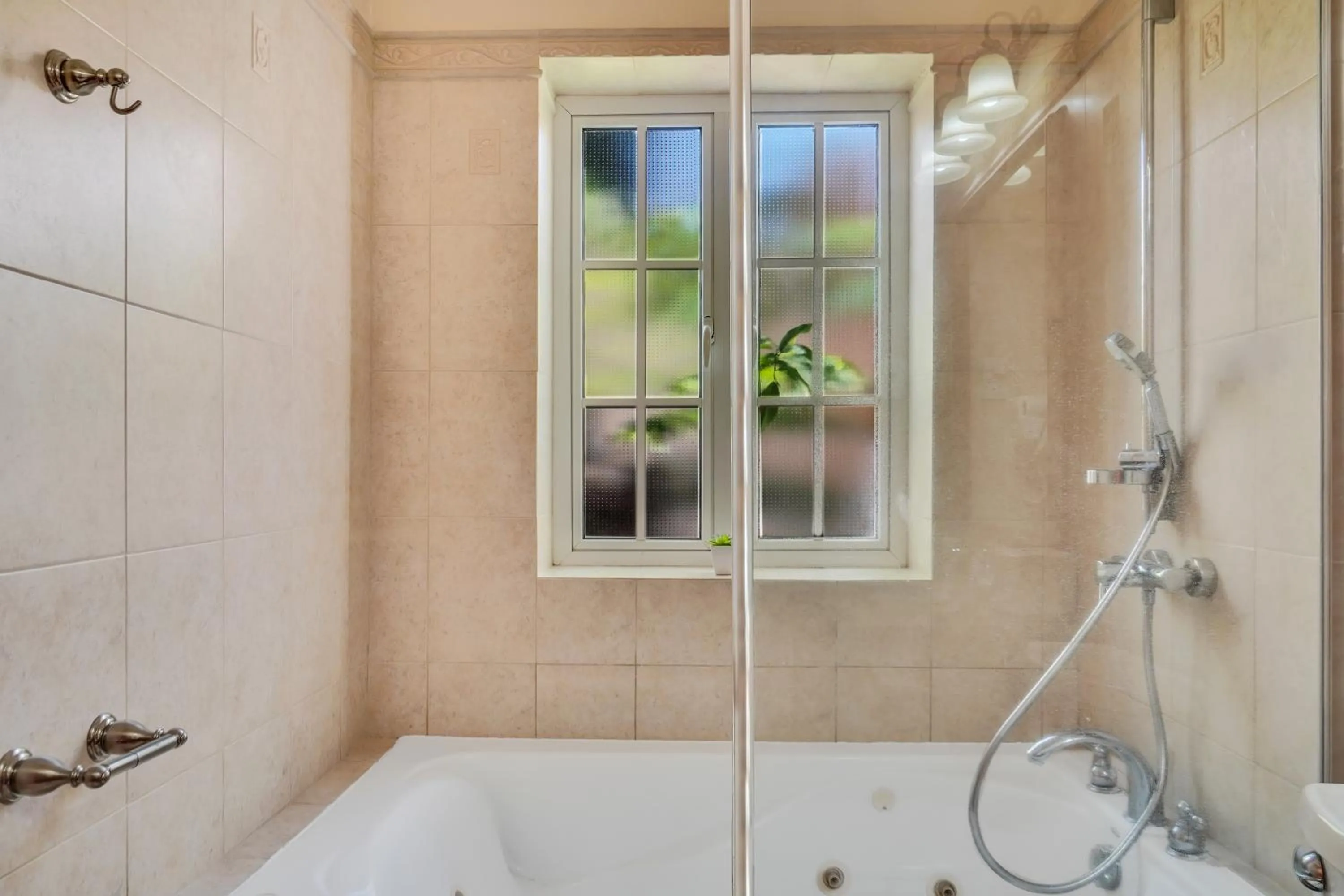 Shower in Mandela Court Suites Grenada