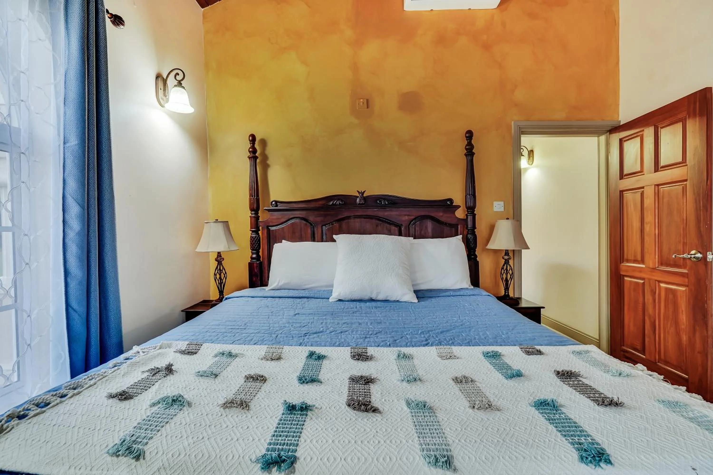 Bed in Mandela Court Suites Grenada