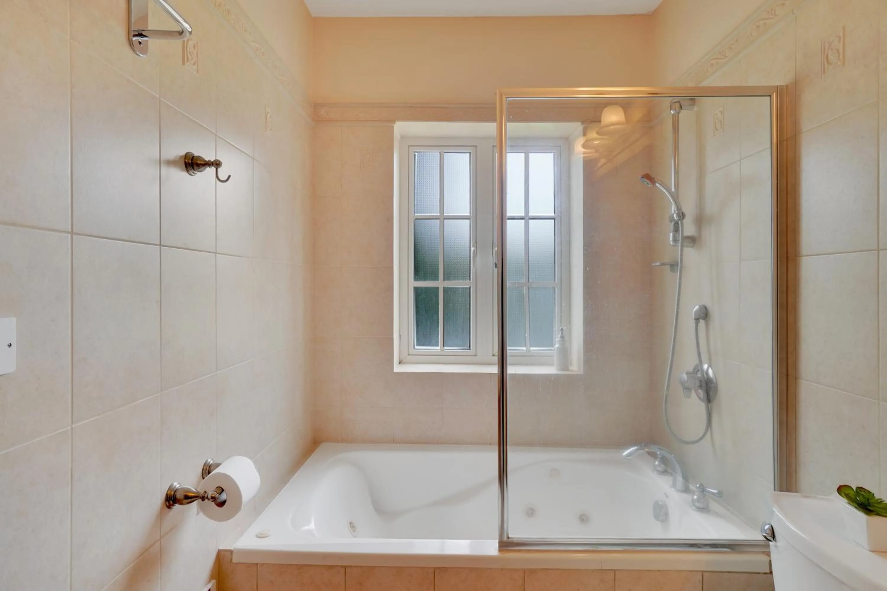 Shower in Mandela Court Suites Grenada