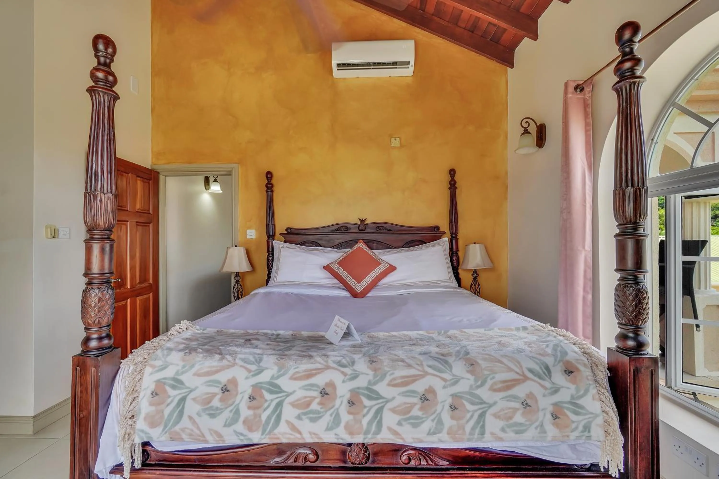 Bed in Mandela Court Suites Grenada