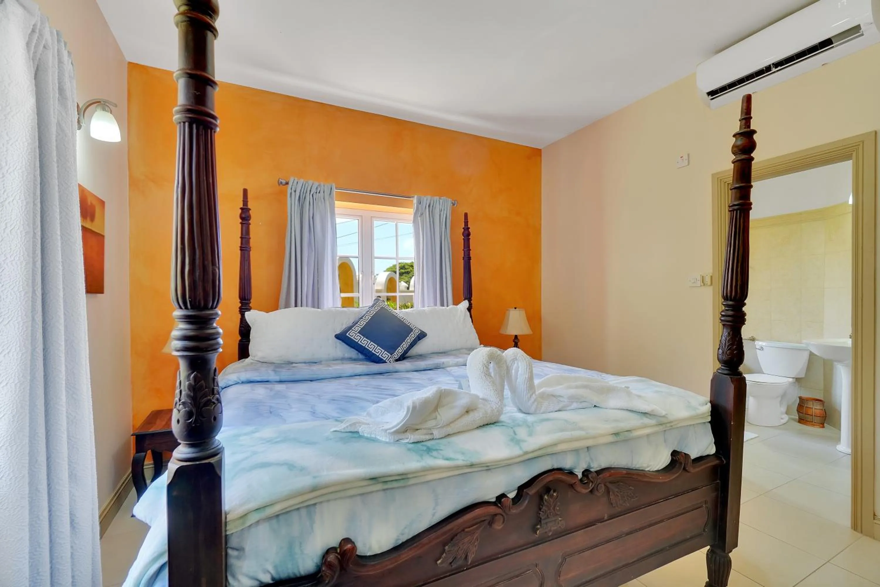 Bed in Mandela Court Suites Grenada