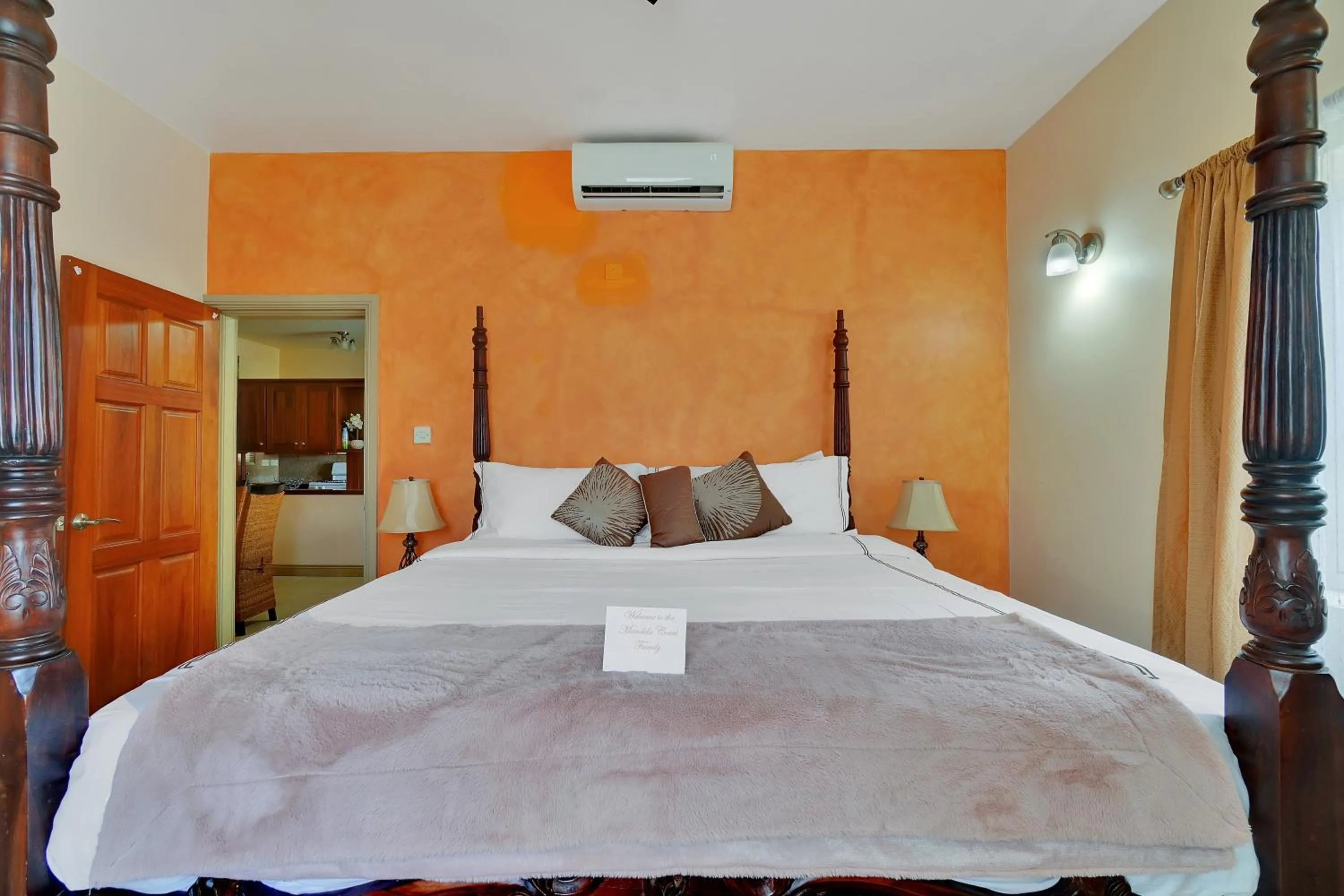 Bed in Mandela Court Suites Grenada