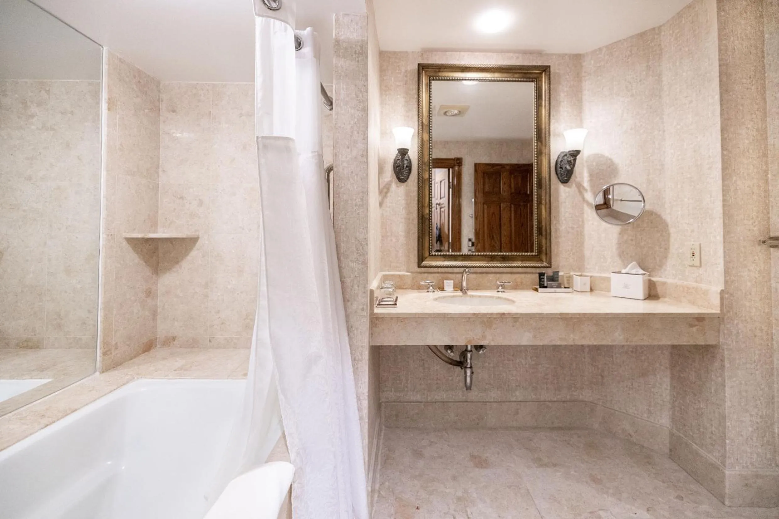 Shower in Chateau Merrimack Hotel & Spa