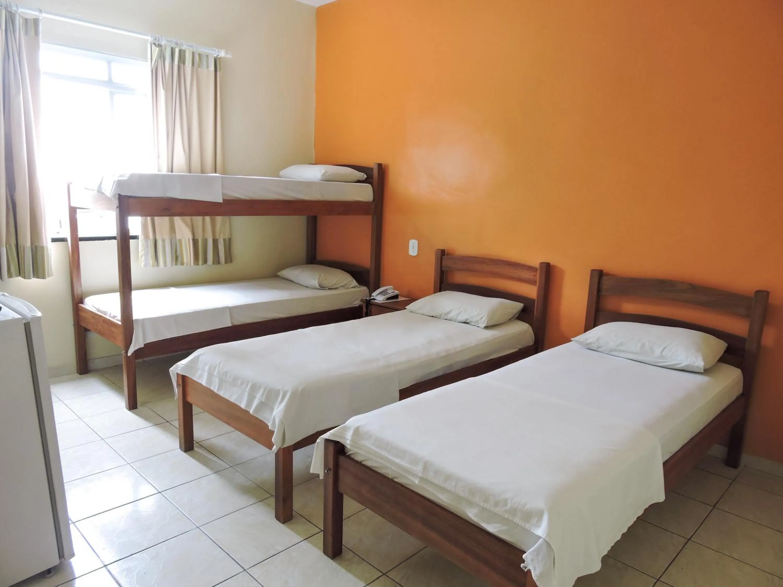 Bed in Pousada Raio de Sol