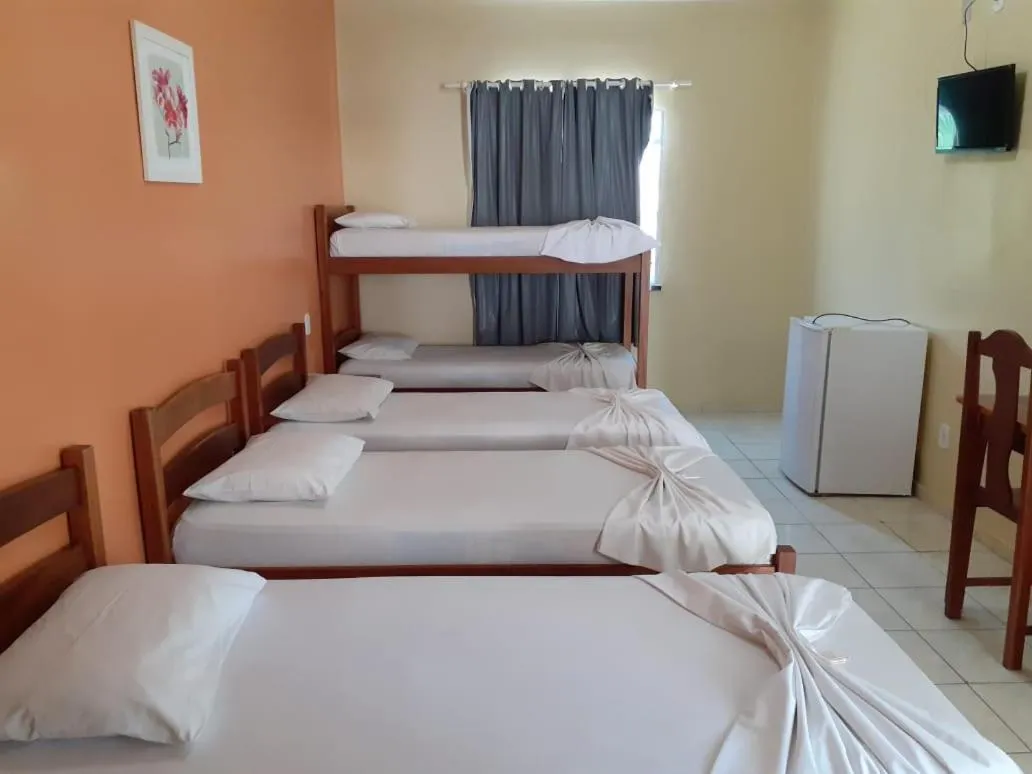 Bed in Pousada Raio de Sol