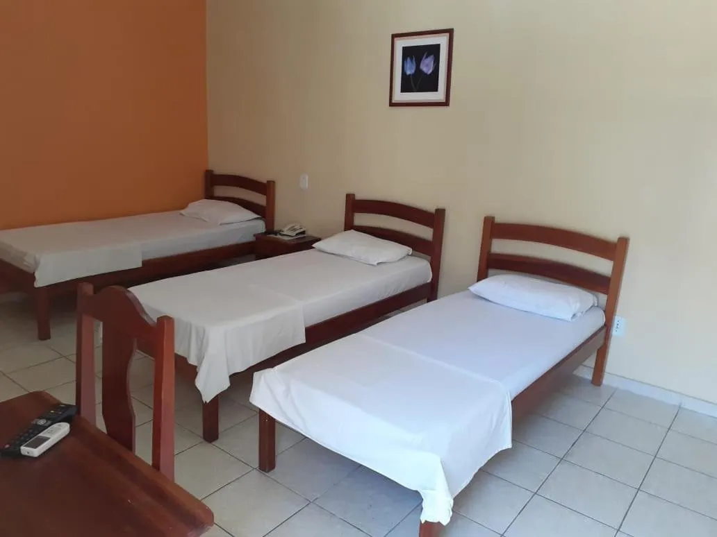 Bed in Pousada Raio de Sol