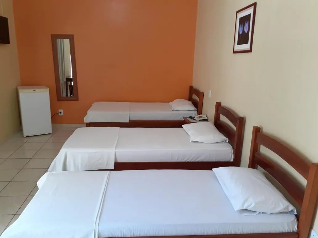 Bed in Pousada Raio de Sol