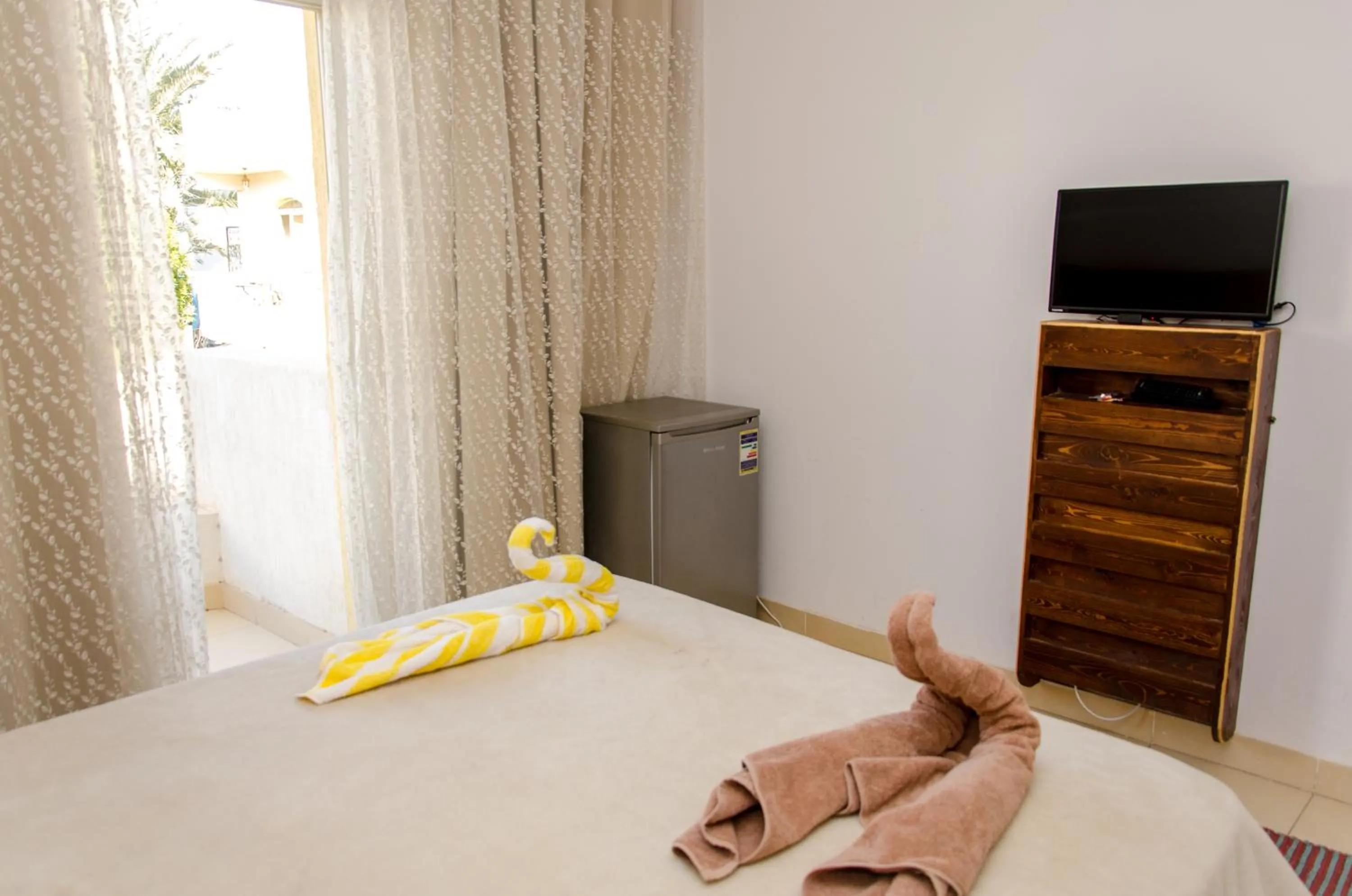 Bed in New Yalla Hotel