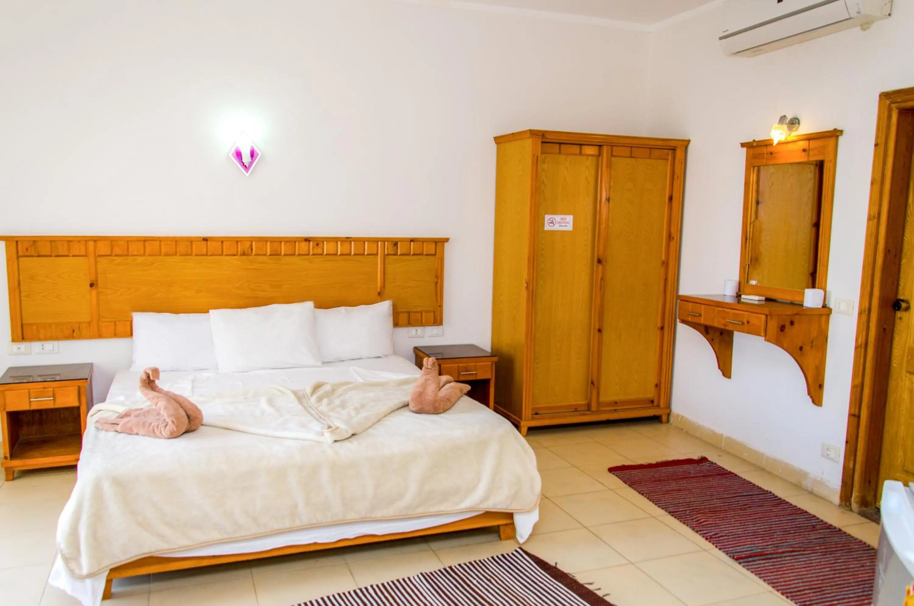 Bed in New Yalla Hotel