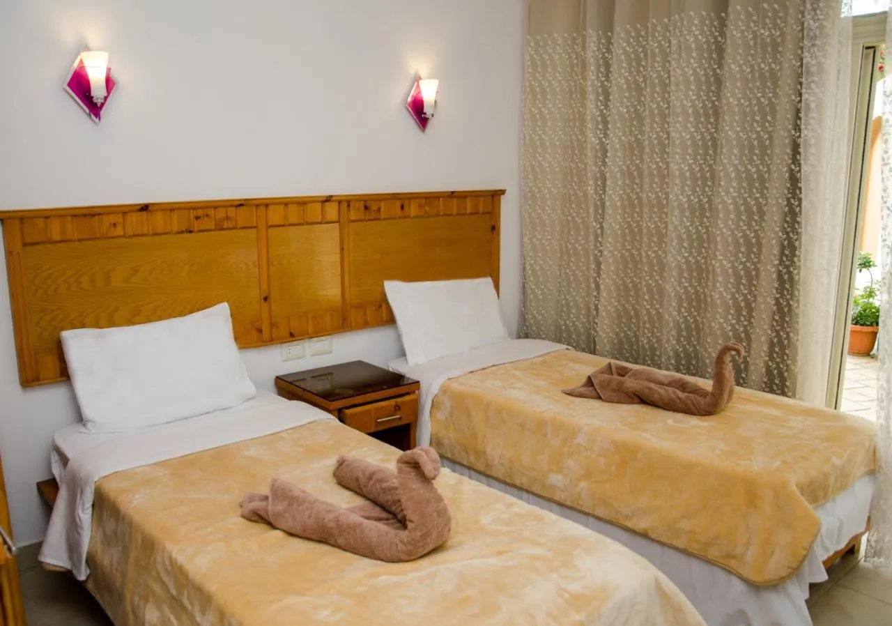 Bed in New Yalla Hotel