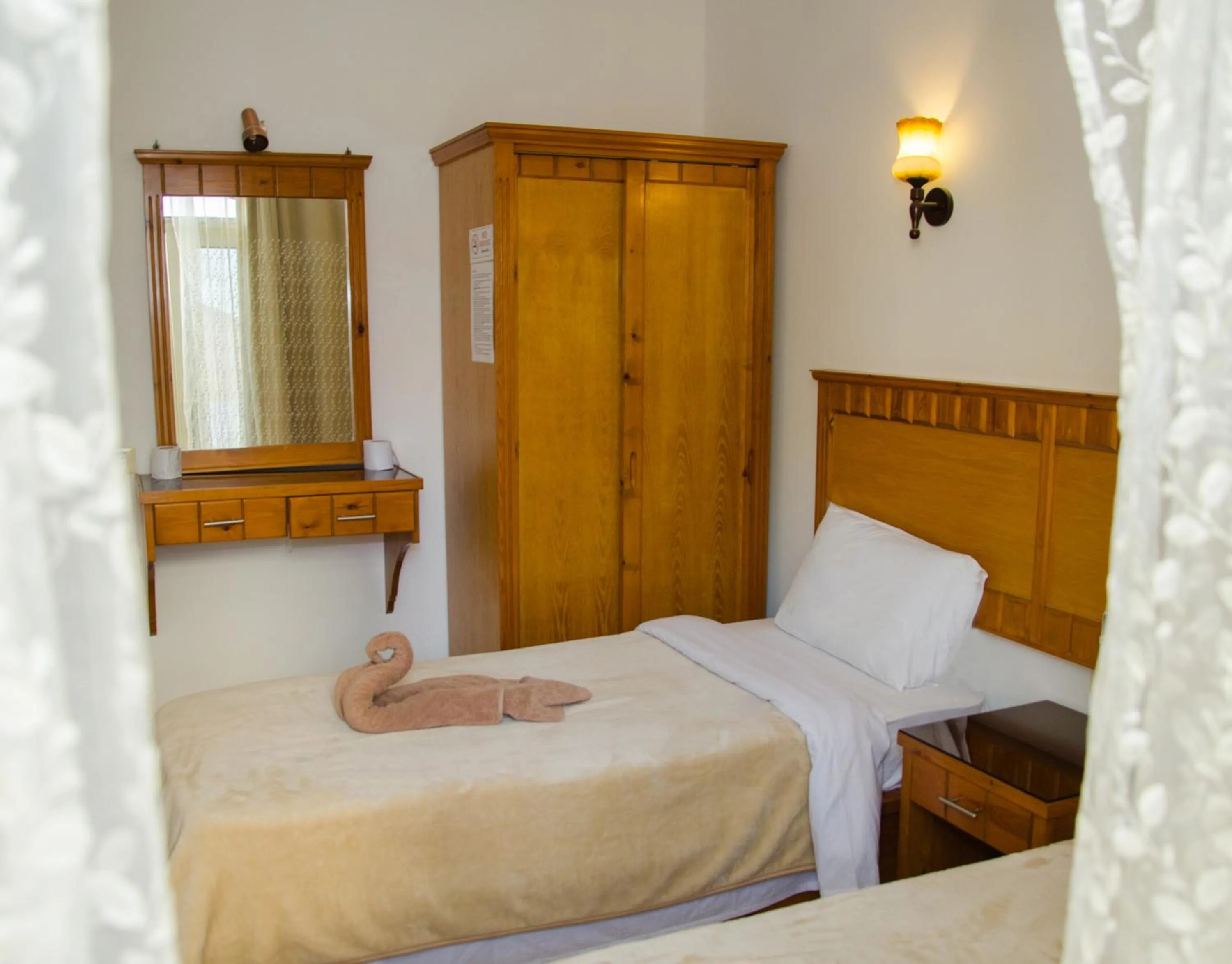 Bed in New Yalla Hotel