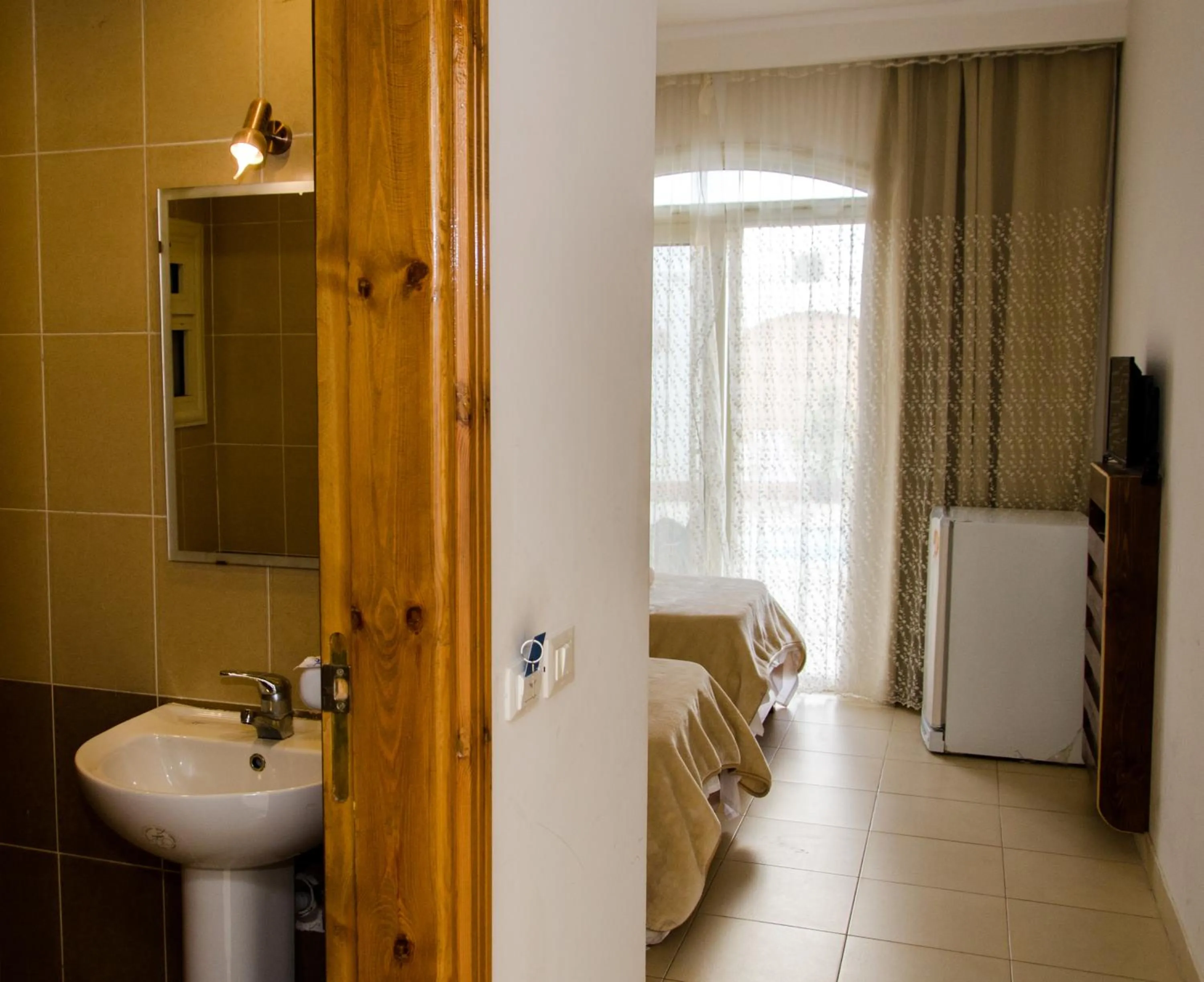 Toilet in New Yalla Hotel