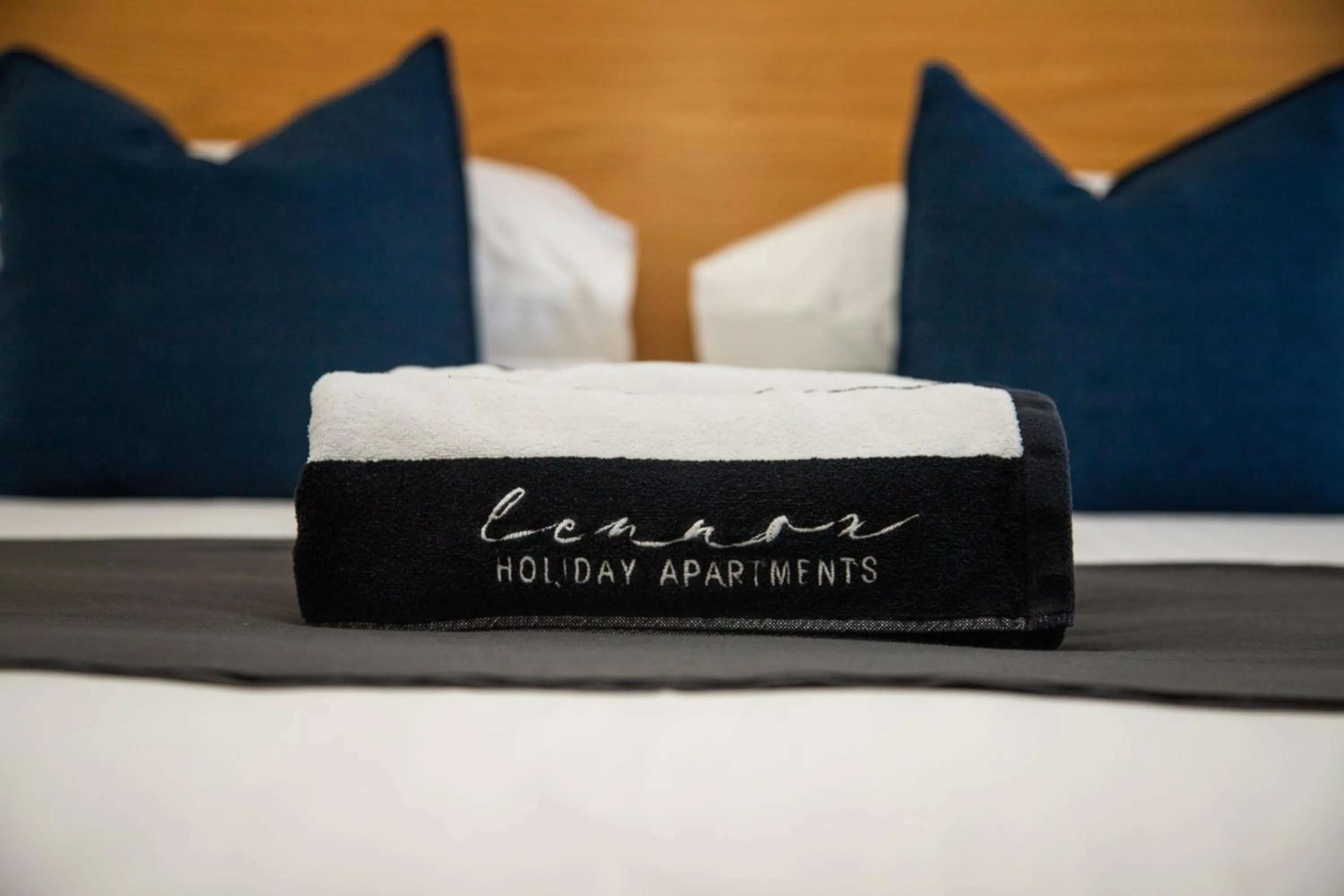 Bed in Lennox Holiday Apartments