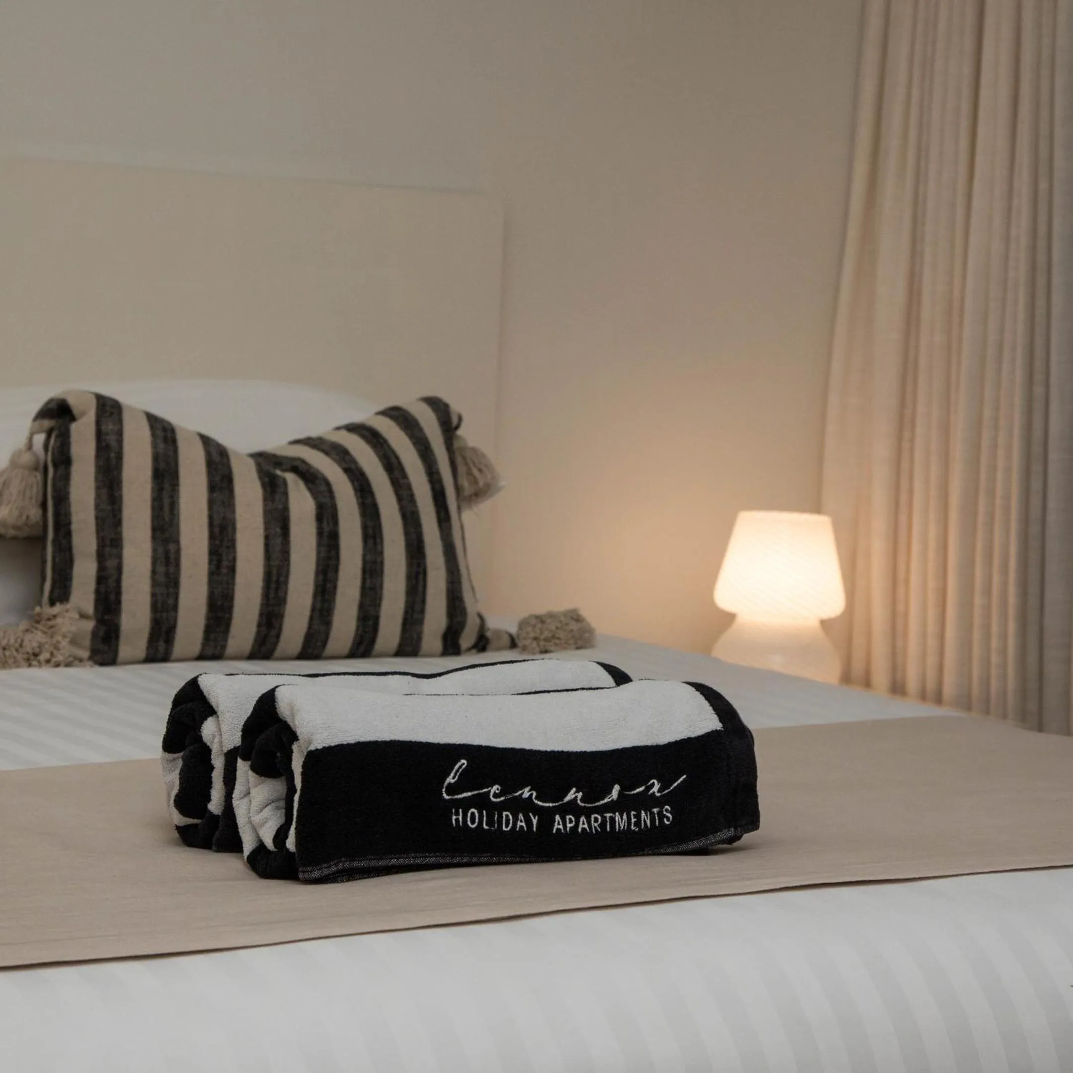 Bed in Lennox Holiday Apartments