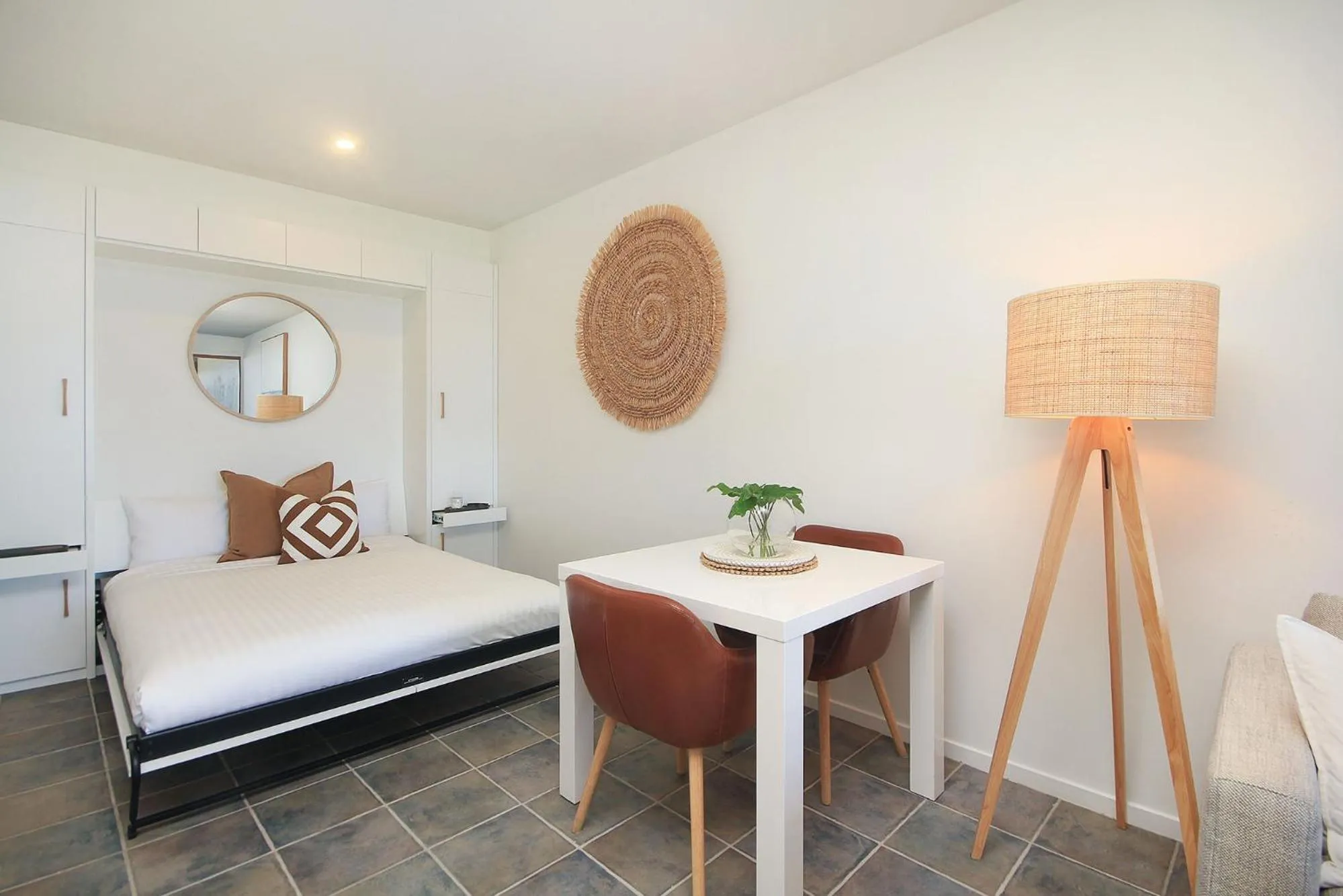 Bed in Lennox Holiday Apartments