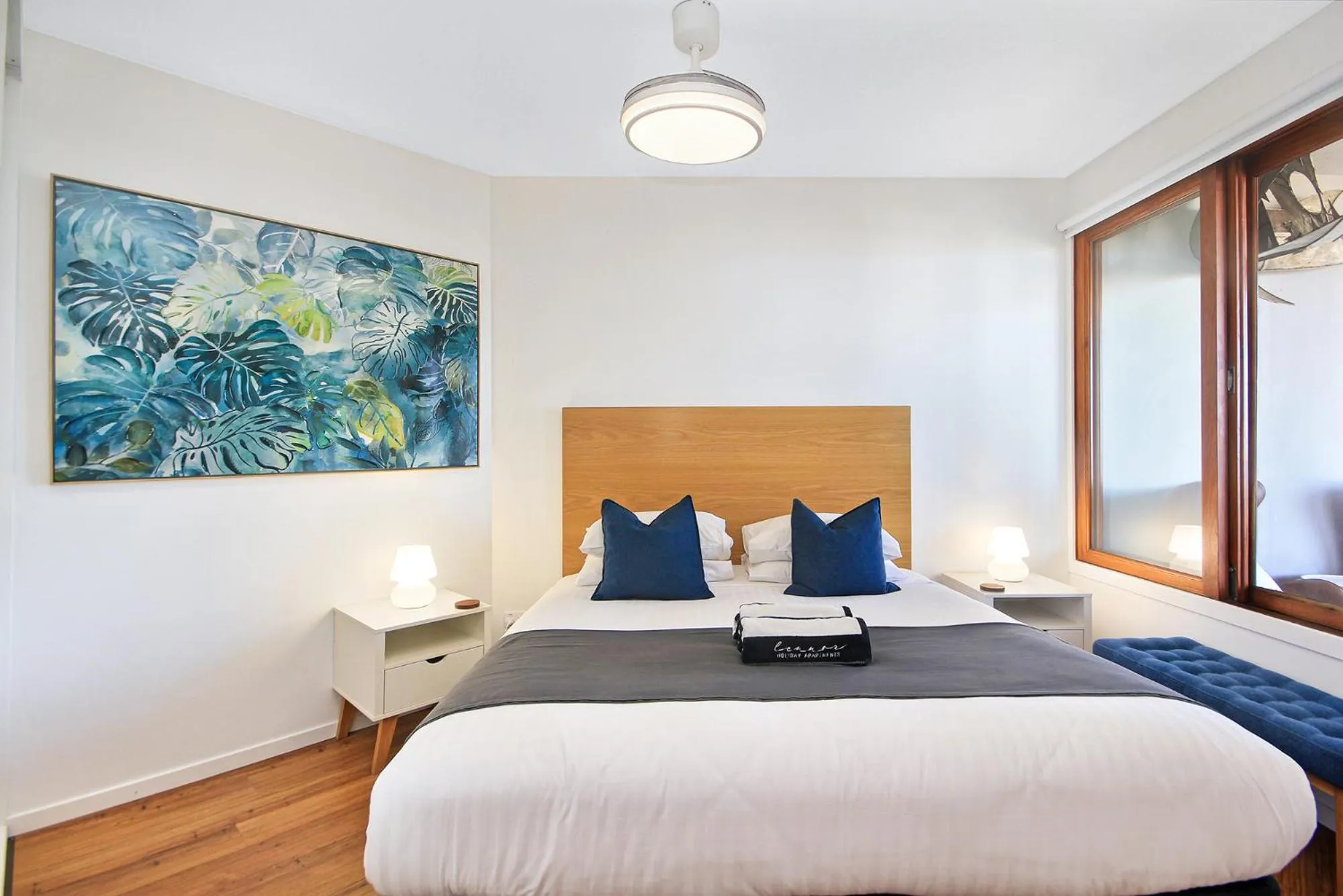 Bed in Lennox Holiday Apartments