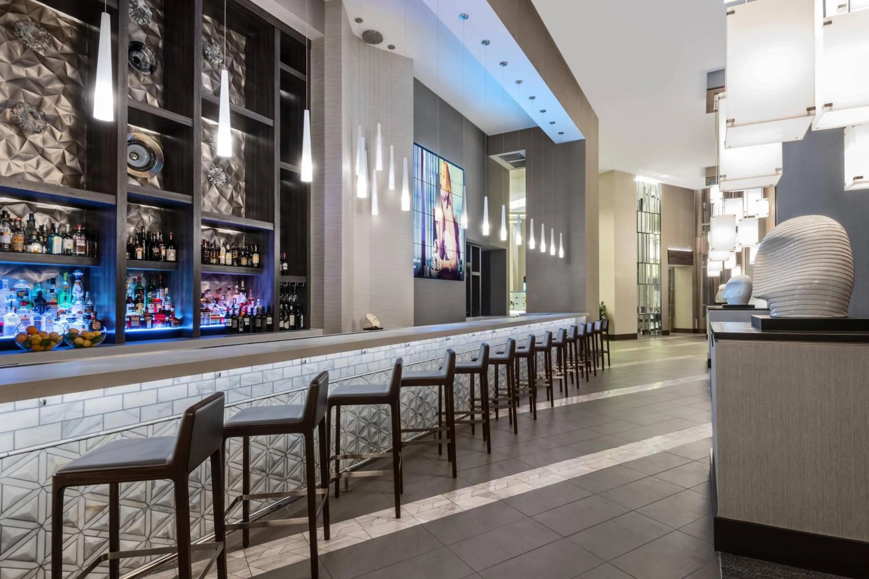 Lounge or bar in AC Hotel by Marriott Charlotte City Center
