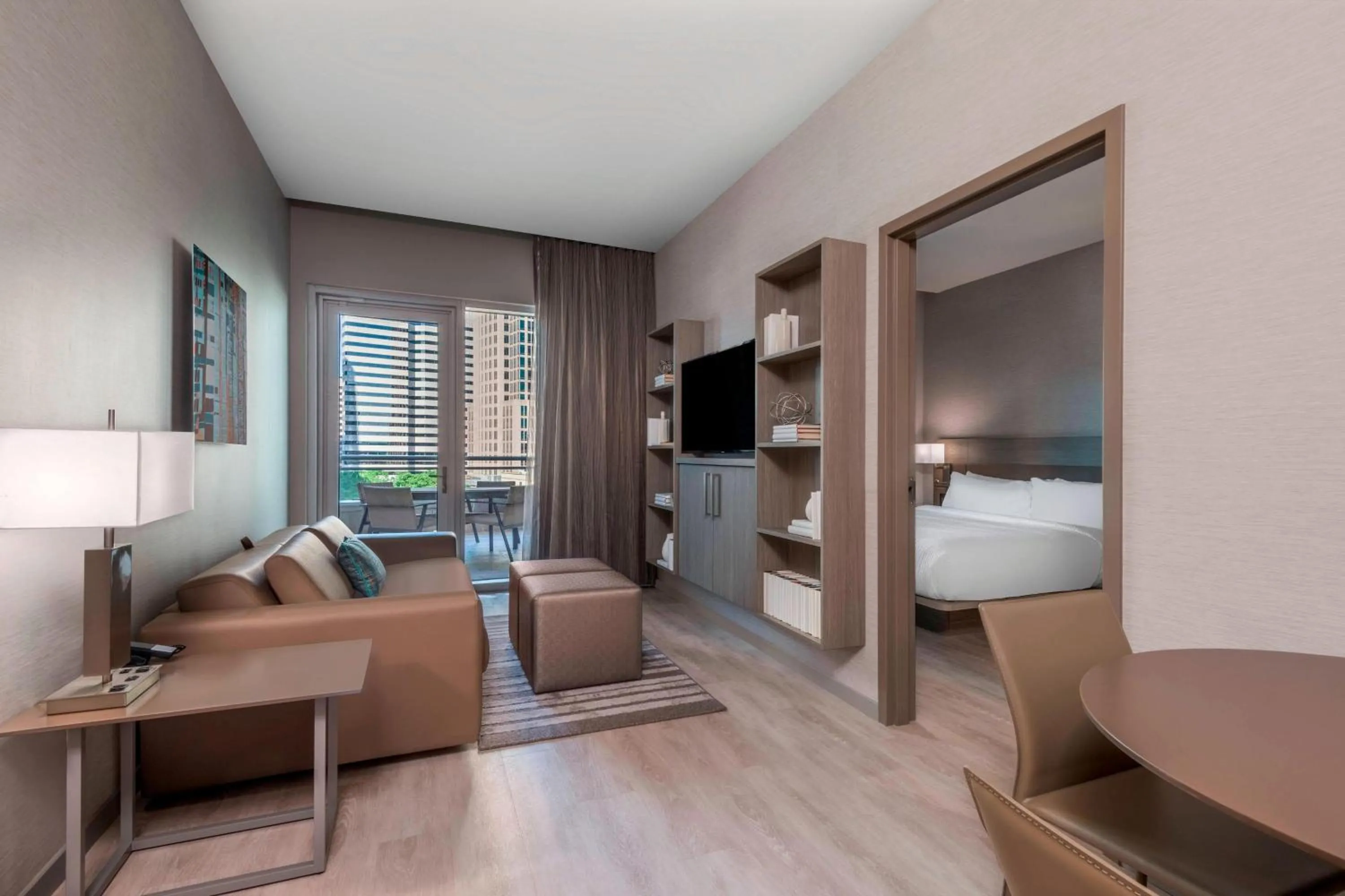 Living room, Bed in AC Hotel by Marriott Charlotte City Center