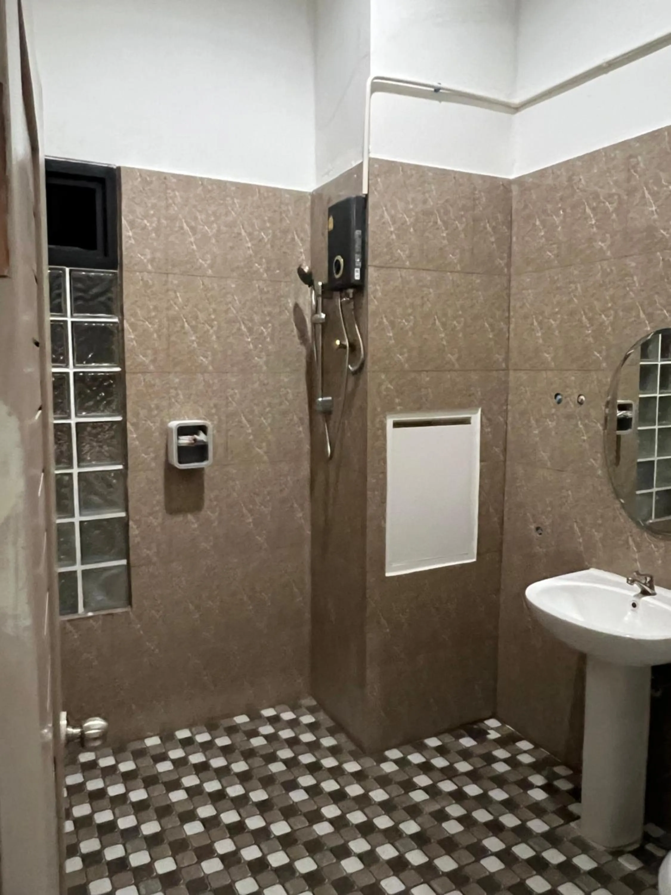 Bathroom in Mall Suites Hotel