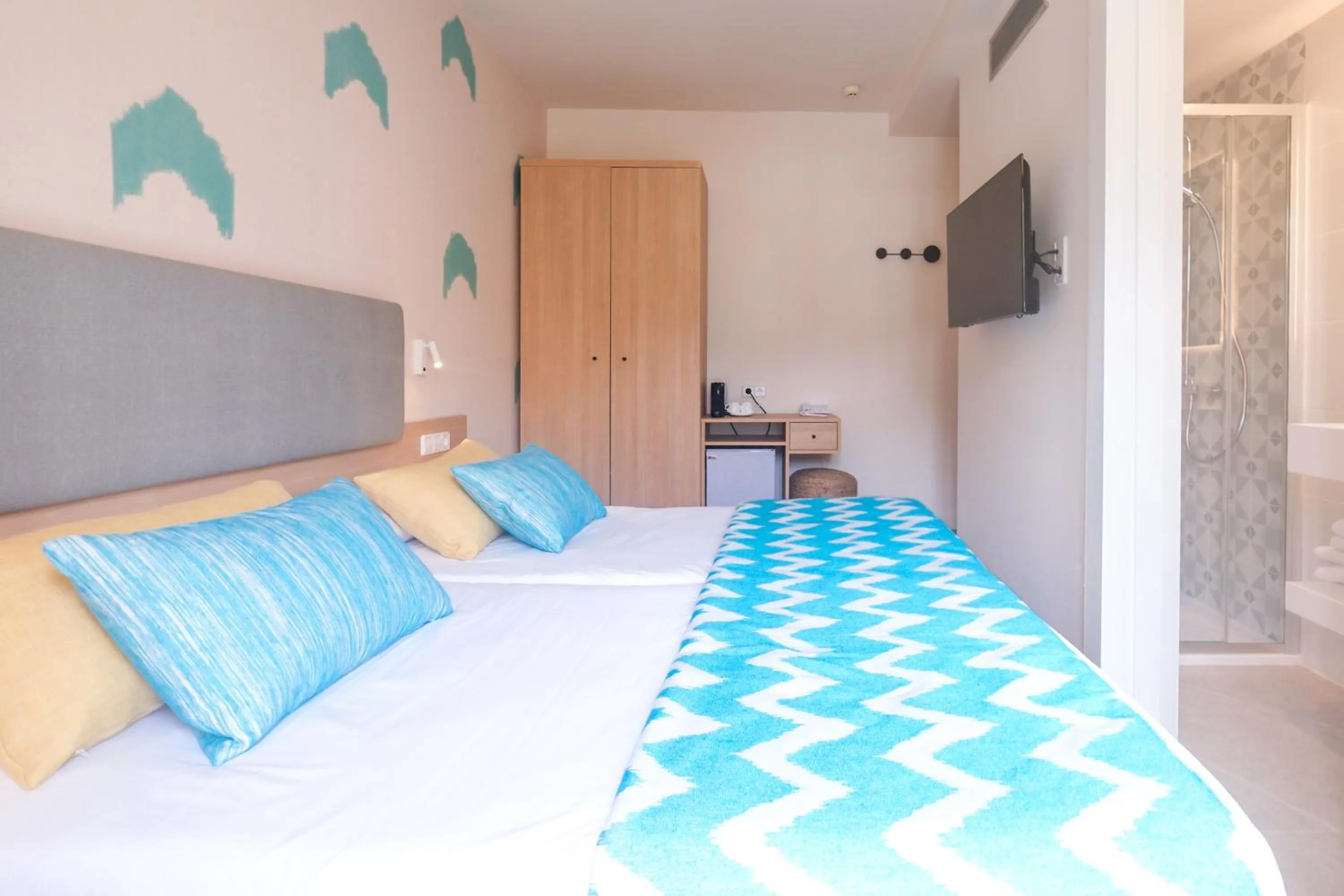 Bed in Cupido Boutique Hotel