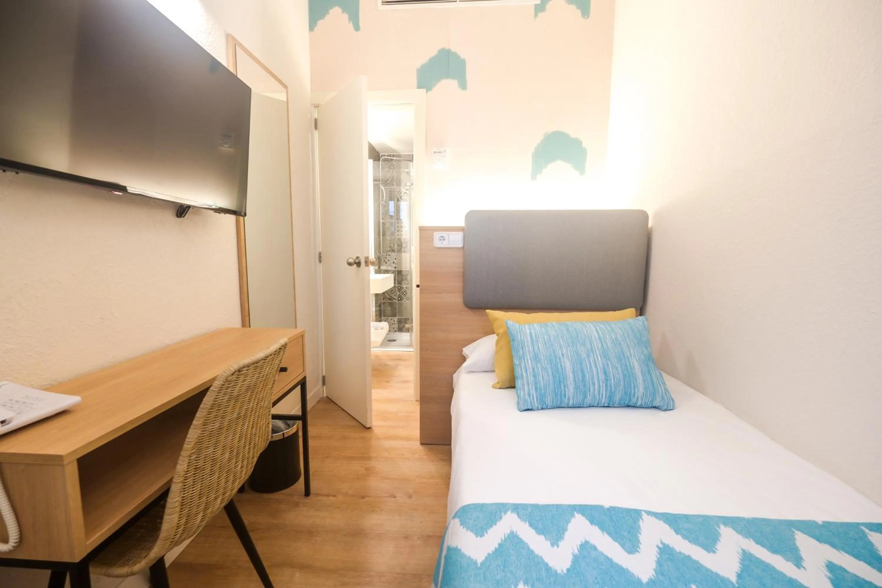 Bed in Cupido Boutique Hotel