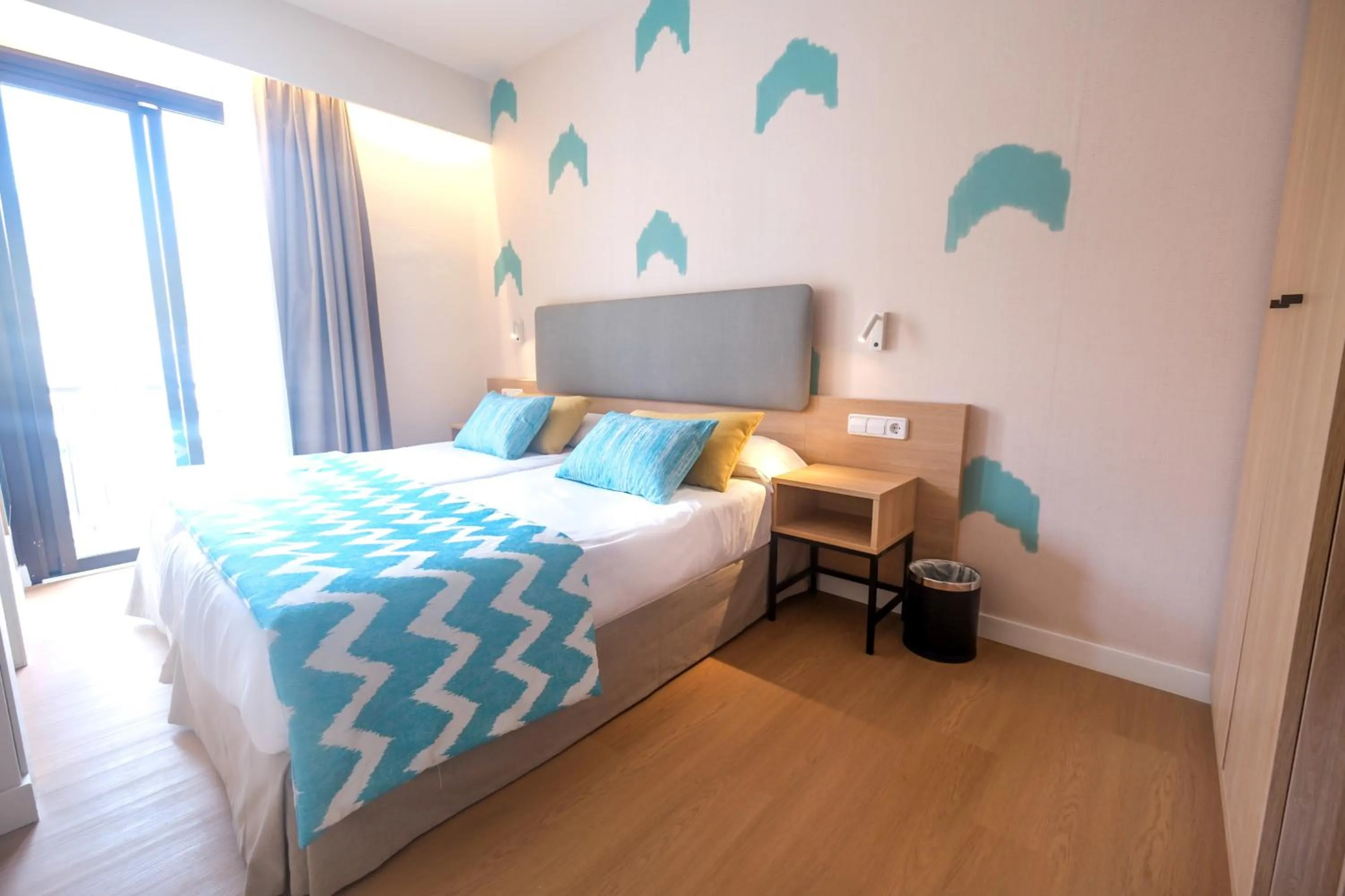 Bed in Cupido Boutique Hotel