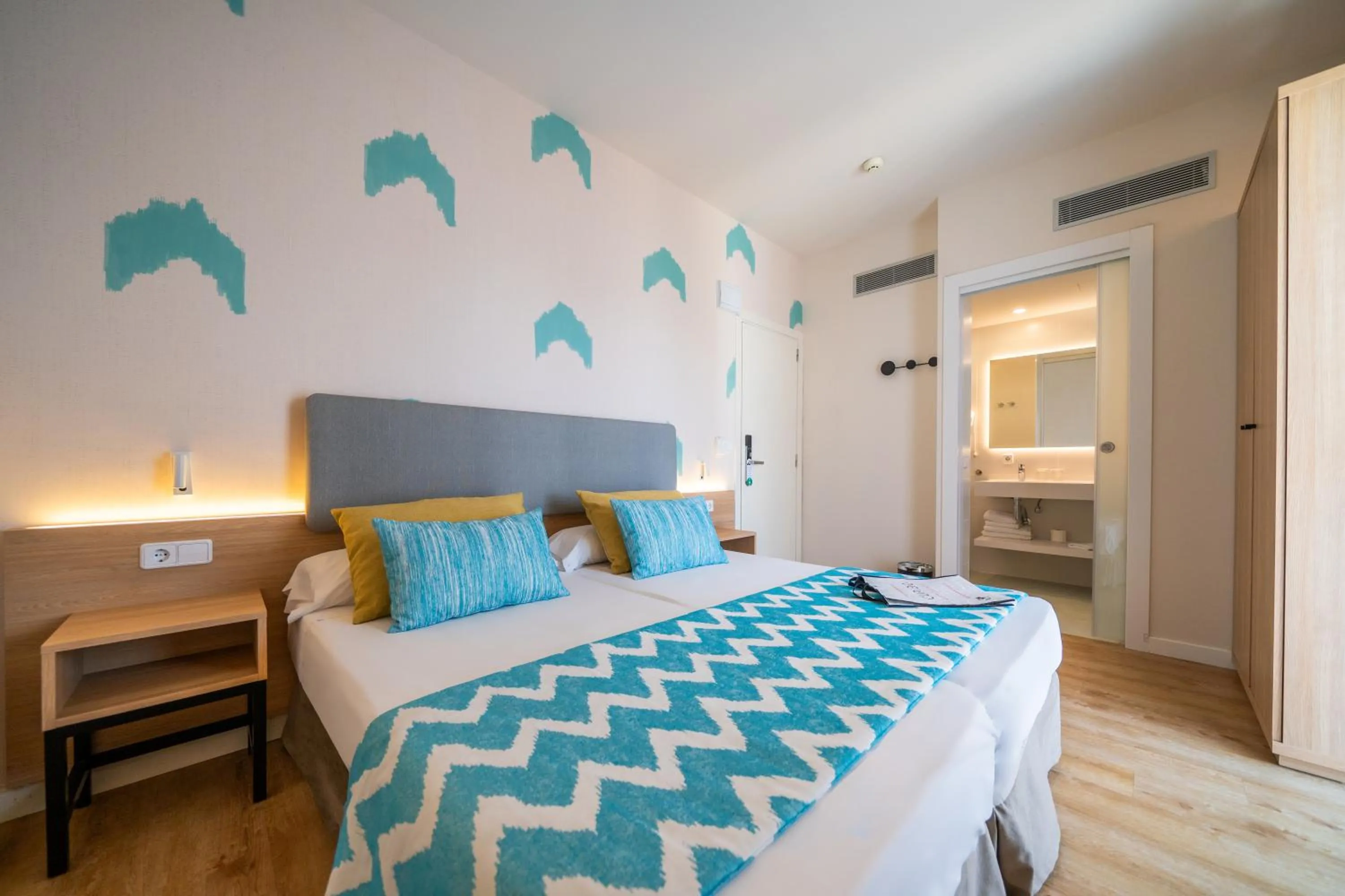 Bed in Cupido Boutique Hotel