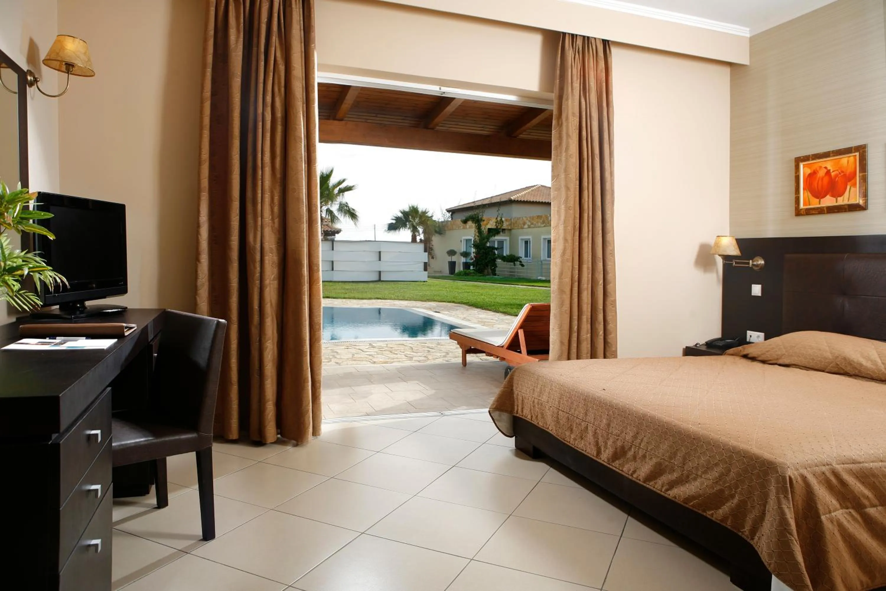 Pool view, Bed in Olympia Golden Beach Resort & Spa