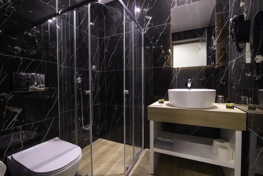 Shower in Poseidon Hotel Sea Resort