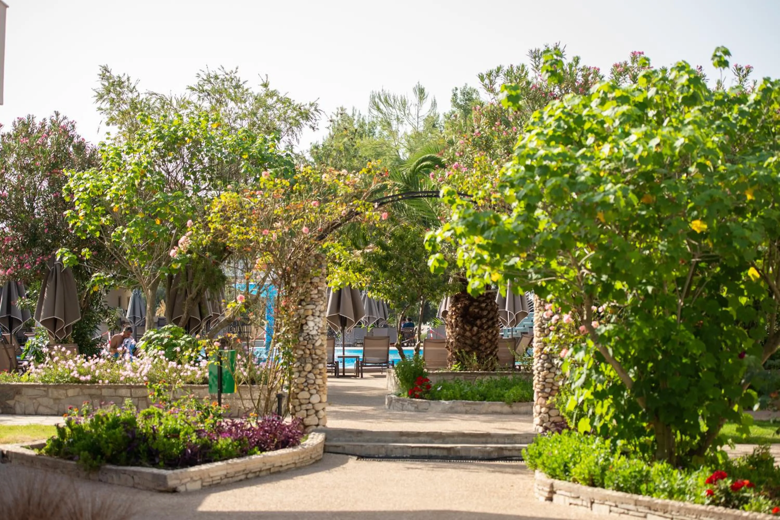 Garden in Poseidon Hotel Sea Resort