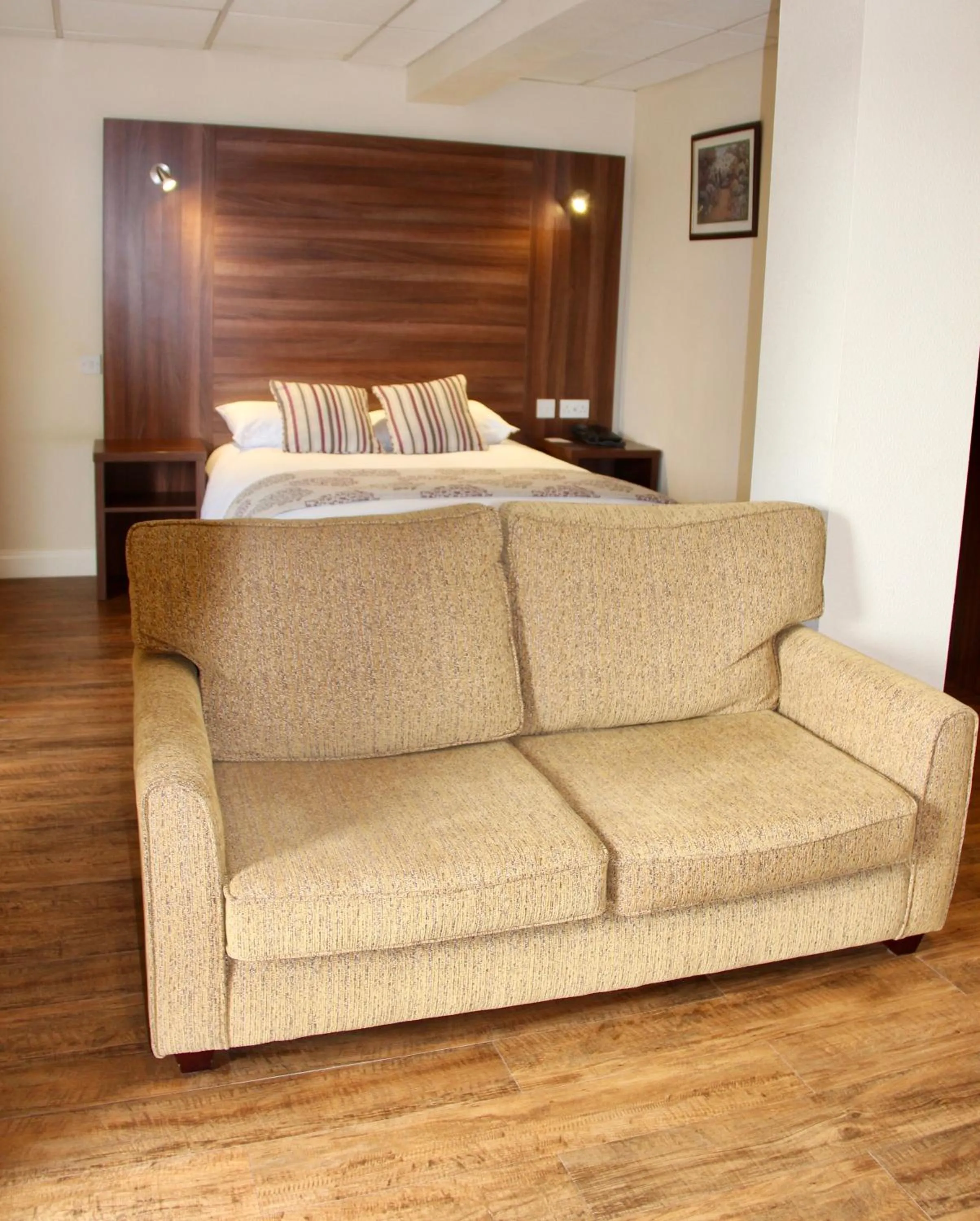 Bed in Oliver Cromwell Hotel