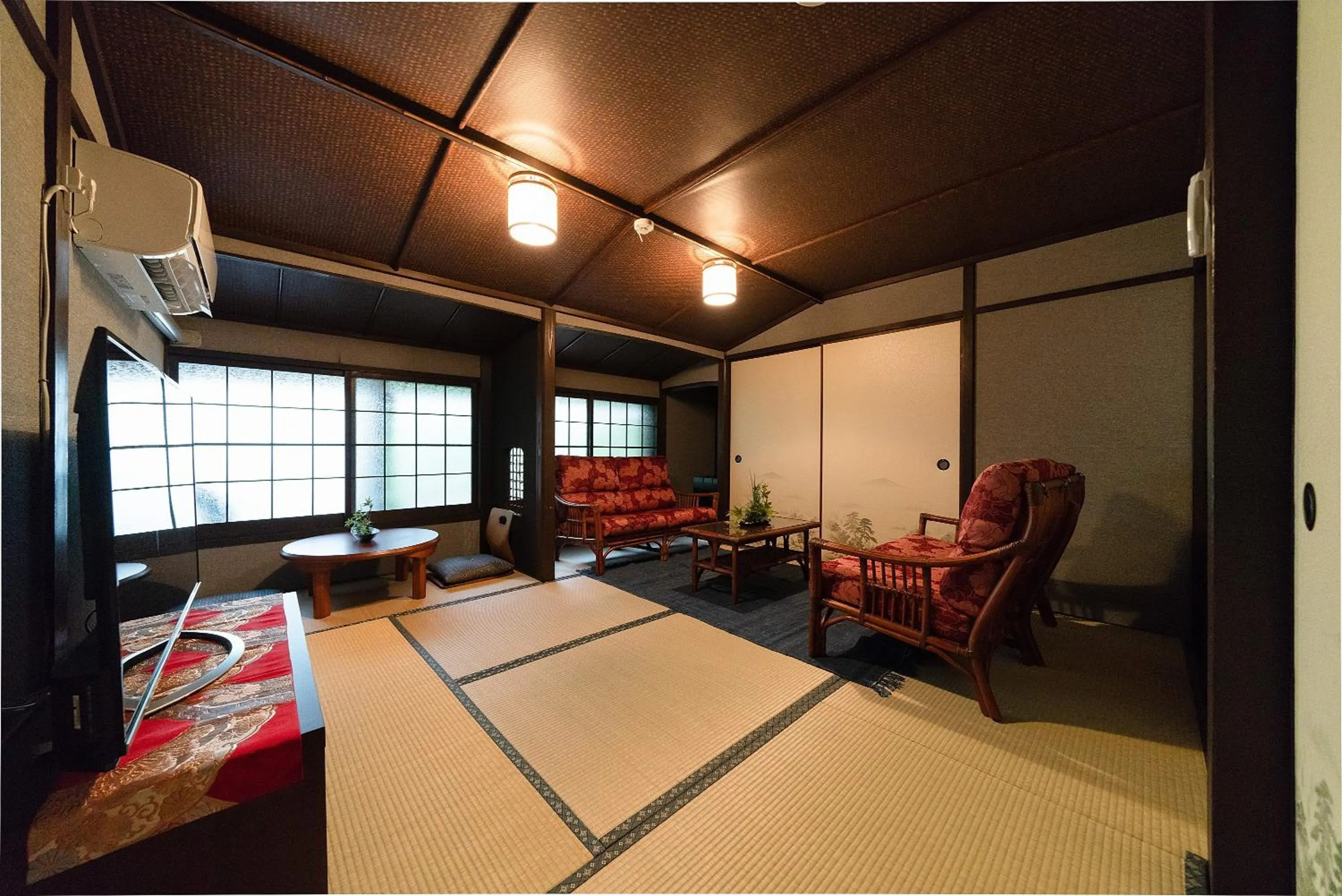 Living room, Bed in Yurakuan - Awagami Residence Inn