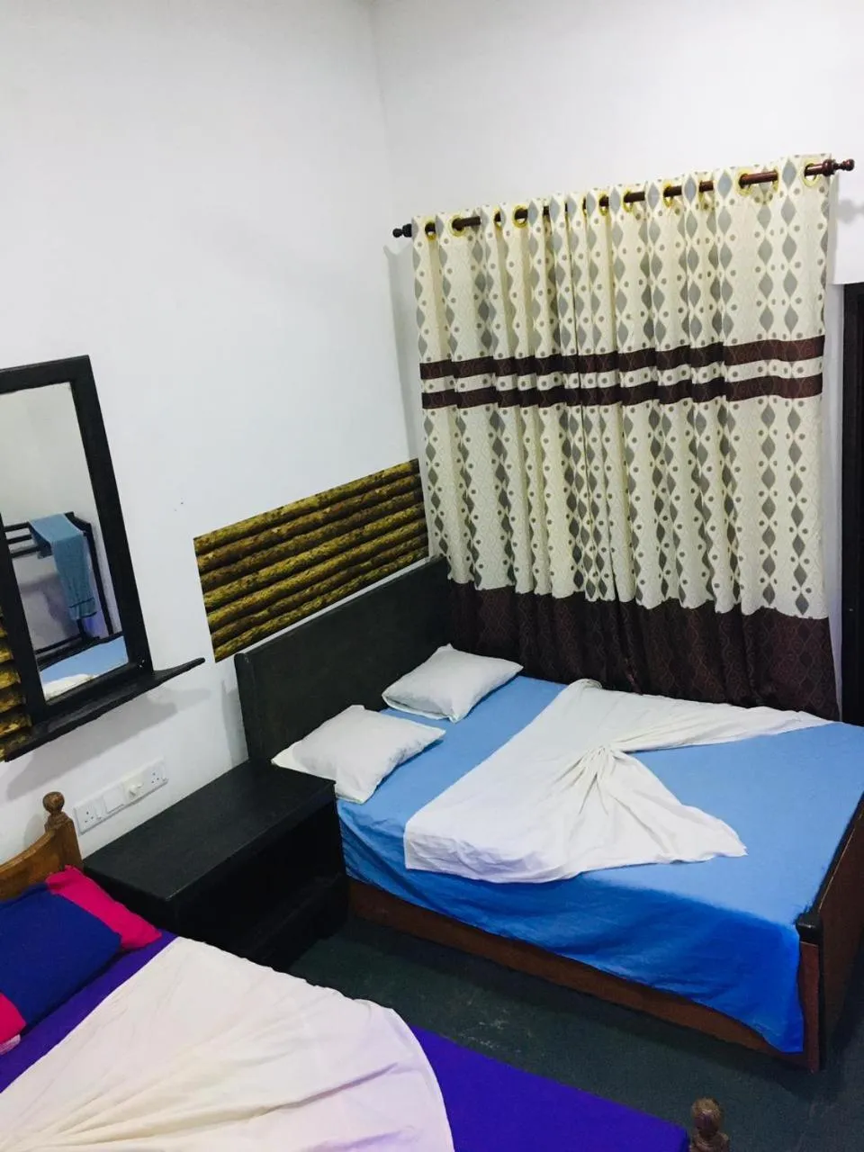 Bed in Bathiya Tourist Guest Anuradhapura