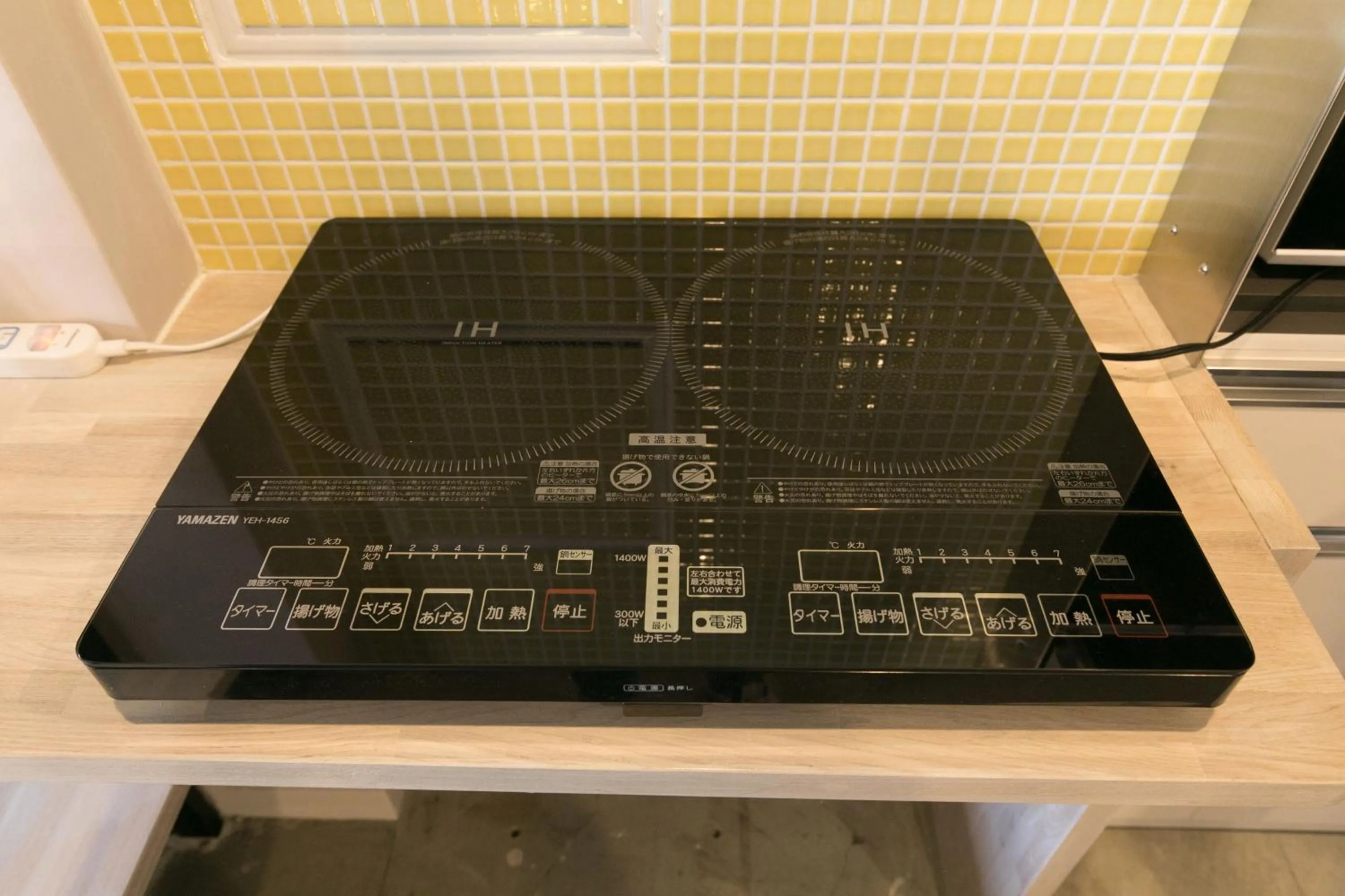 Communal kitchen in hostel DEN