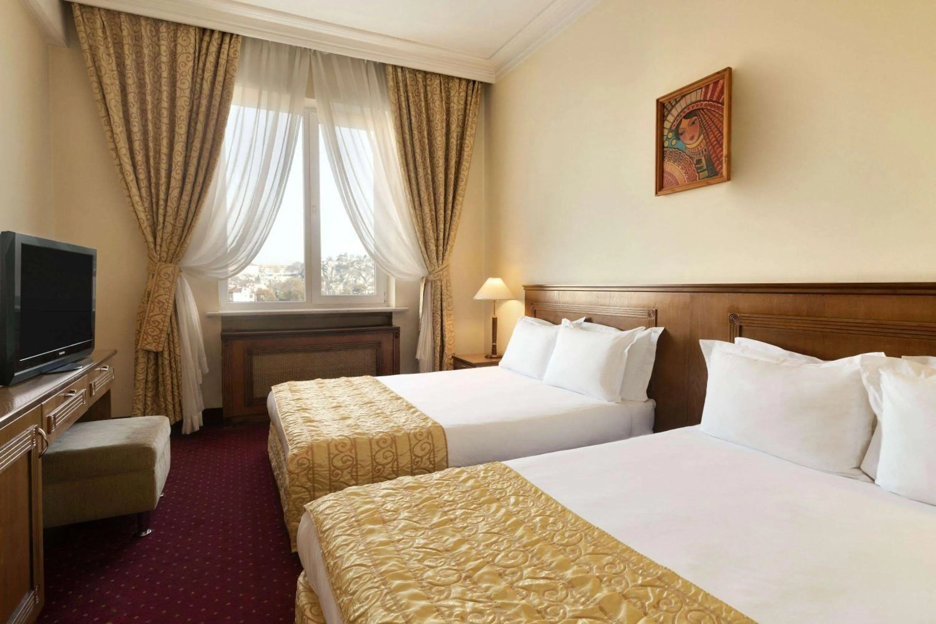 Bed in Ramada by Wyndham Plovdiv Trimontium