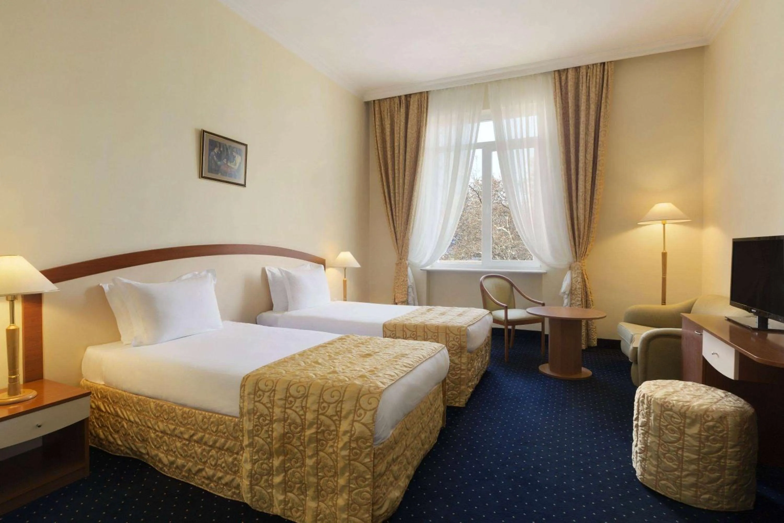 Photo of the whole room, Bed in Ramada by Wyndham Plovdiv Trimontium