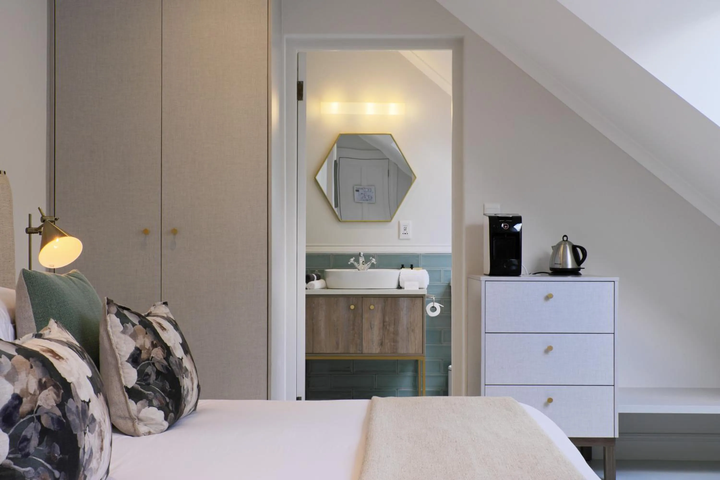 Bed in Chapter House Boutique Hotel by The Living Journey Collection