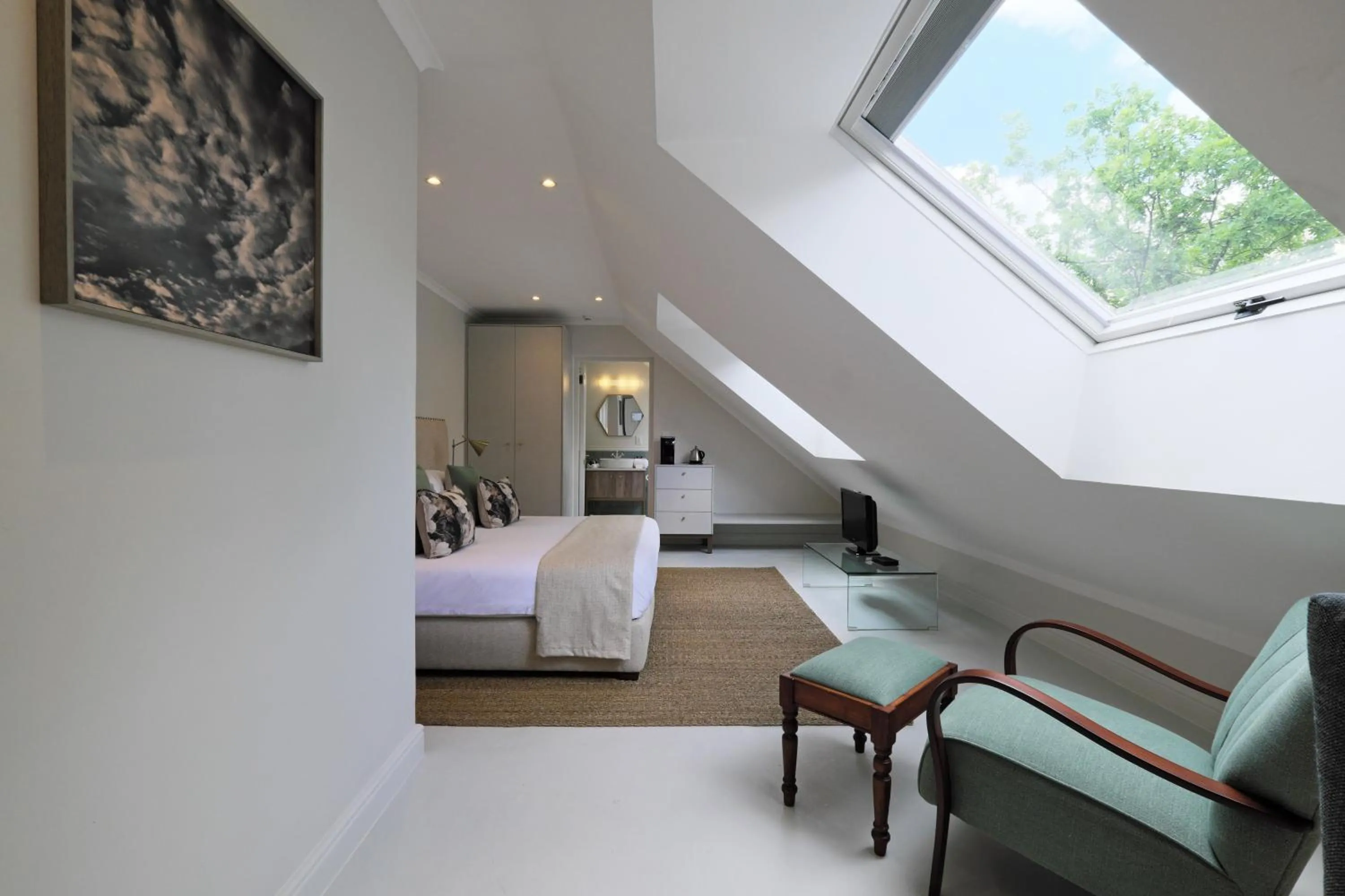Seating area, Bed in Chapter House Boutique Hotel by The Living Journey Collection