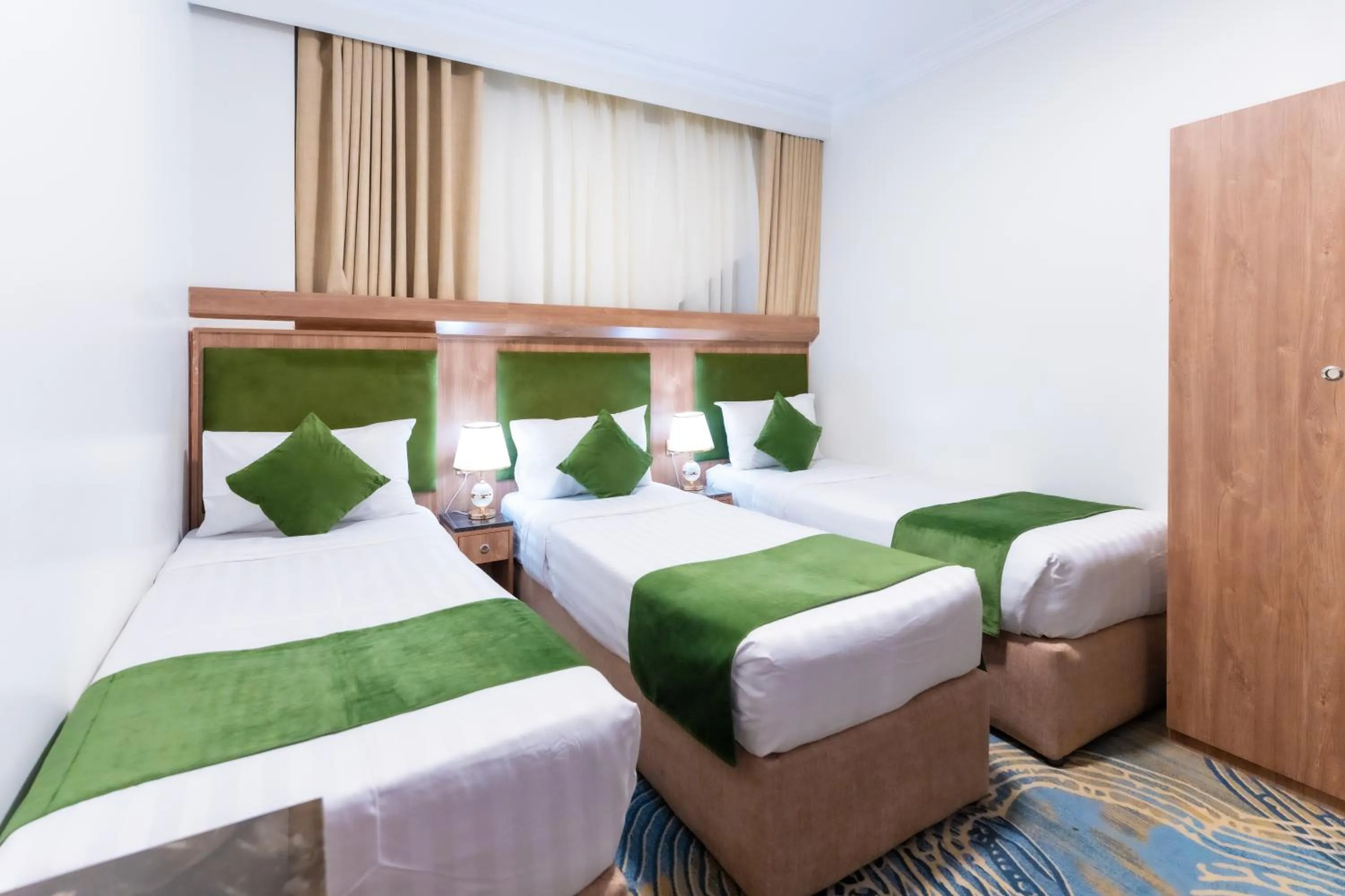 Bed in Hayah Plaza Hotel