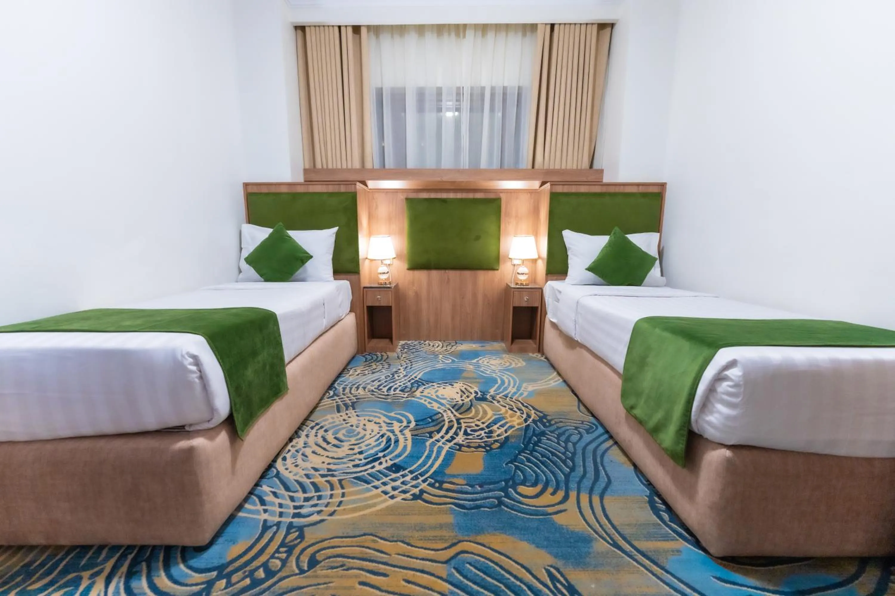 Bed in Hayah Plaza Hotel