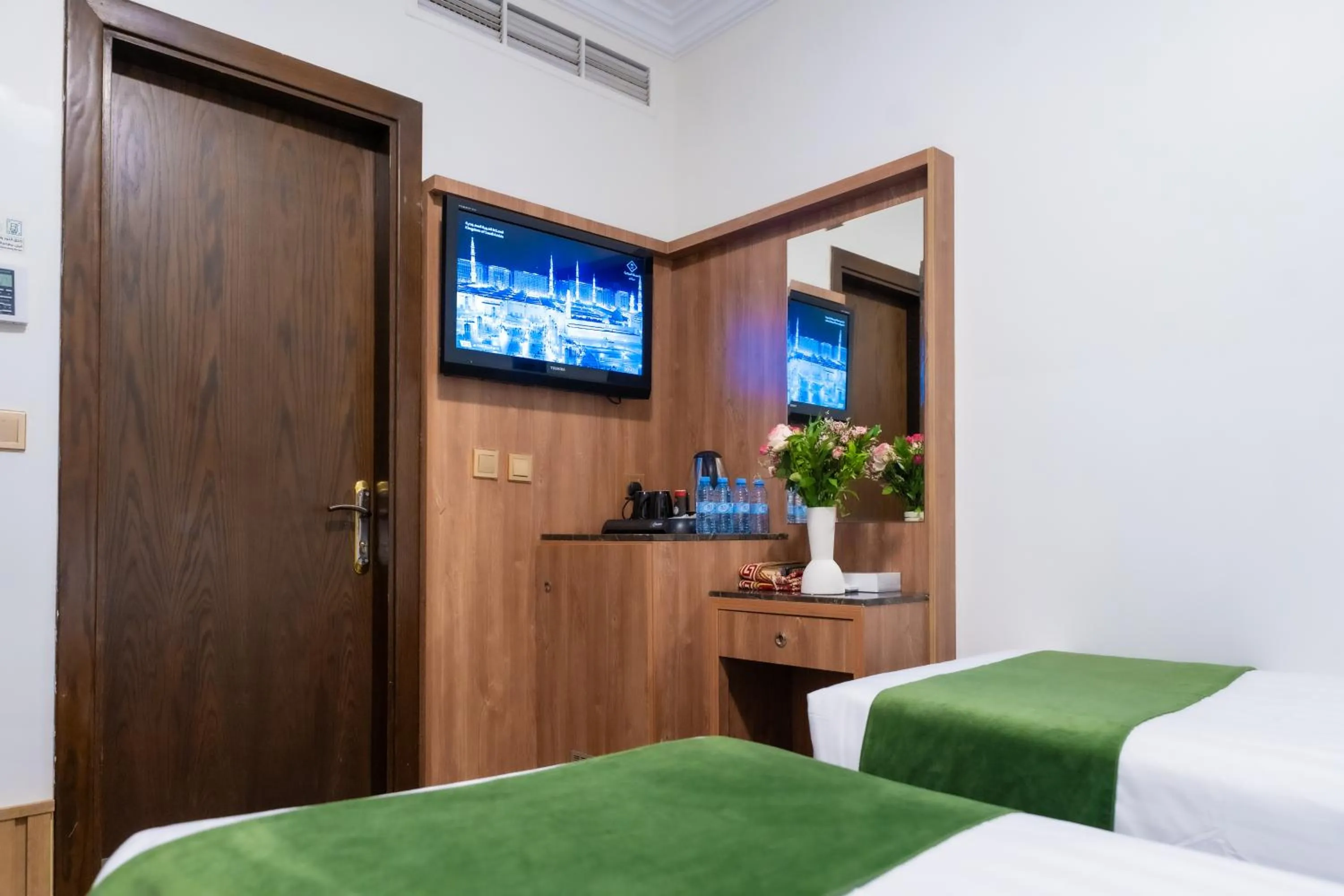 Bed in Hayah Plaza Hotel