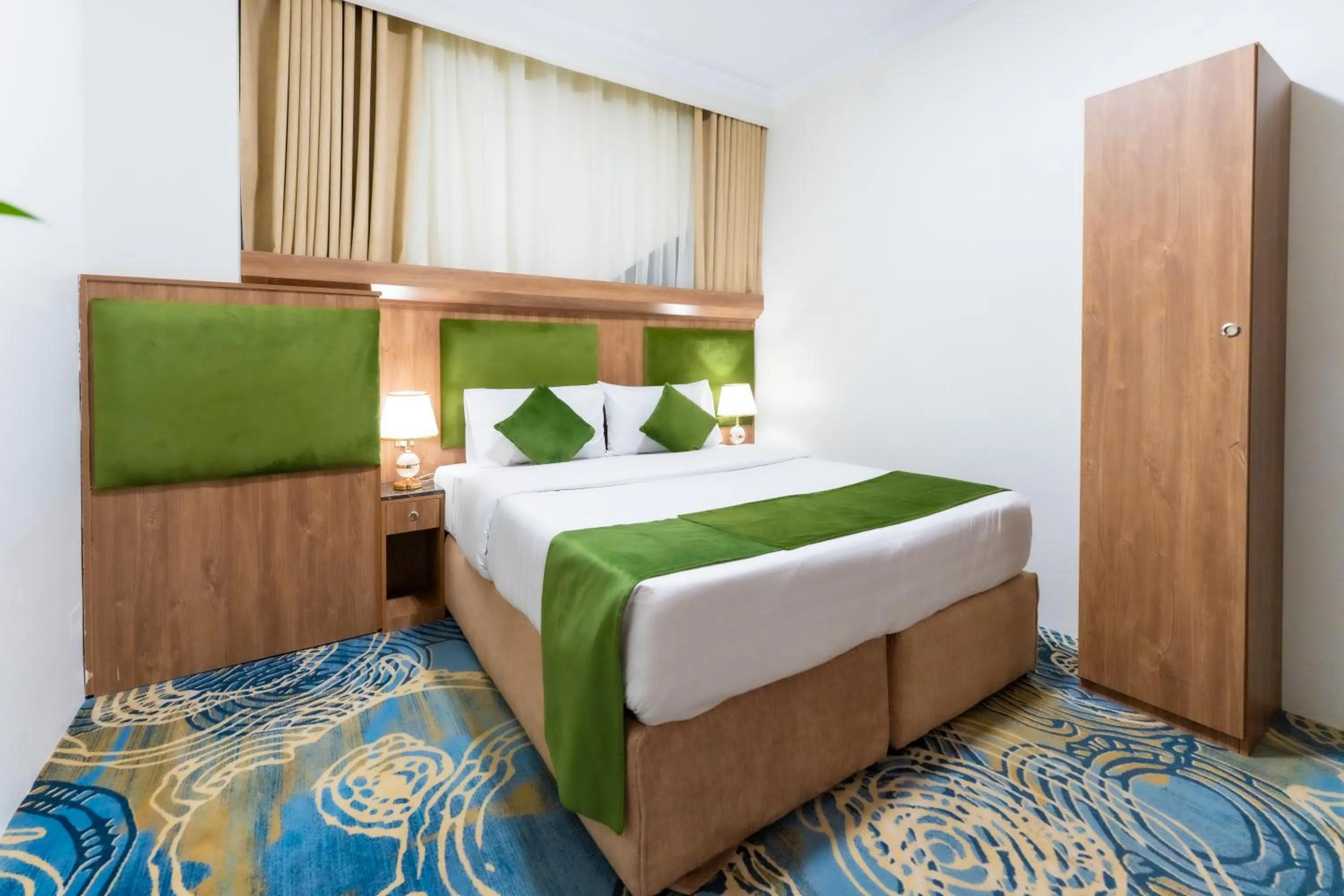 Bed in Hayah Plaza Hotel