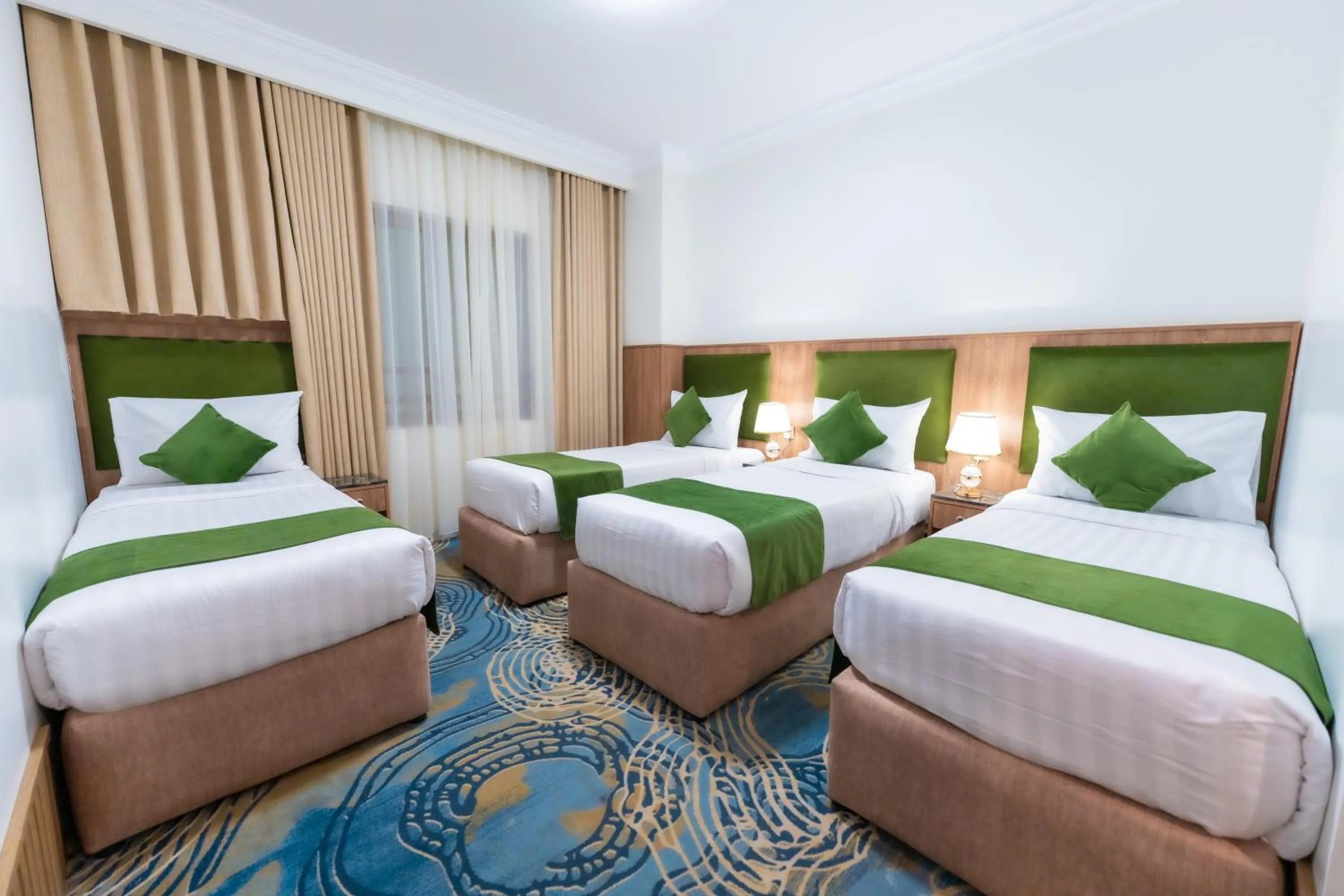 Bed in Hayah Plaza Hotel