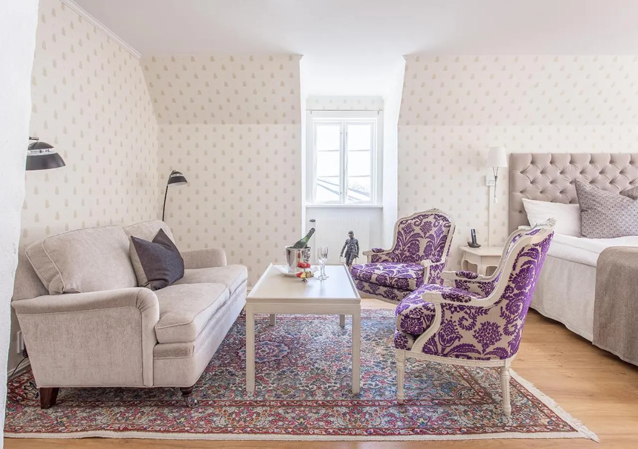 Living room, Bed in Stufvenäs Gästgifveri