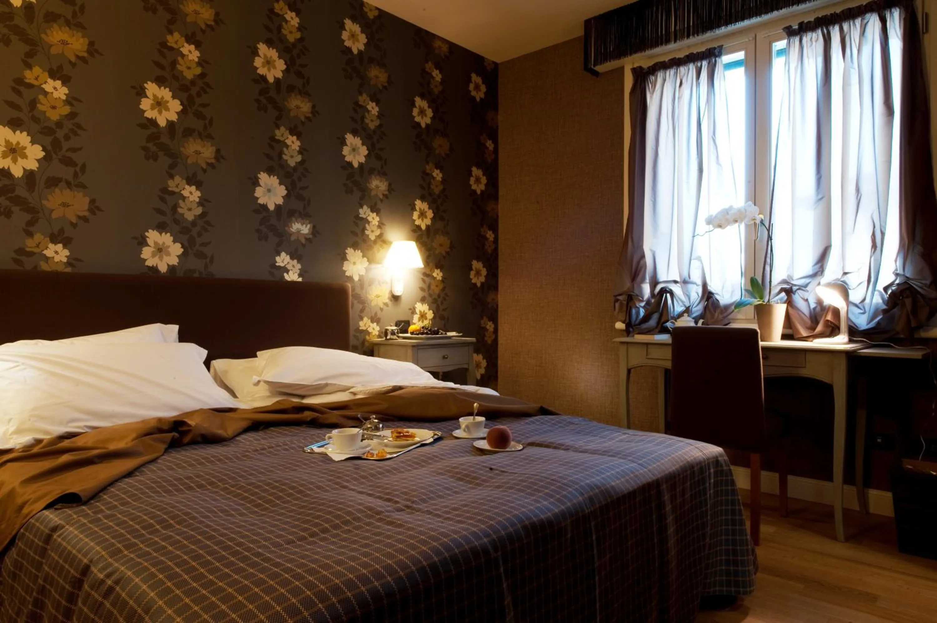 Bed in Hotel Locanda Stendhal