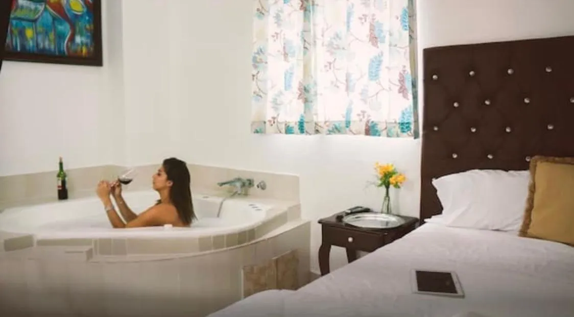 Bed in Hotel Luis V Santo Domingo