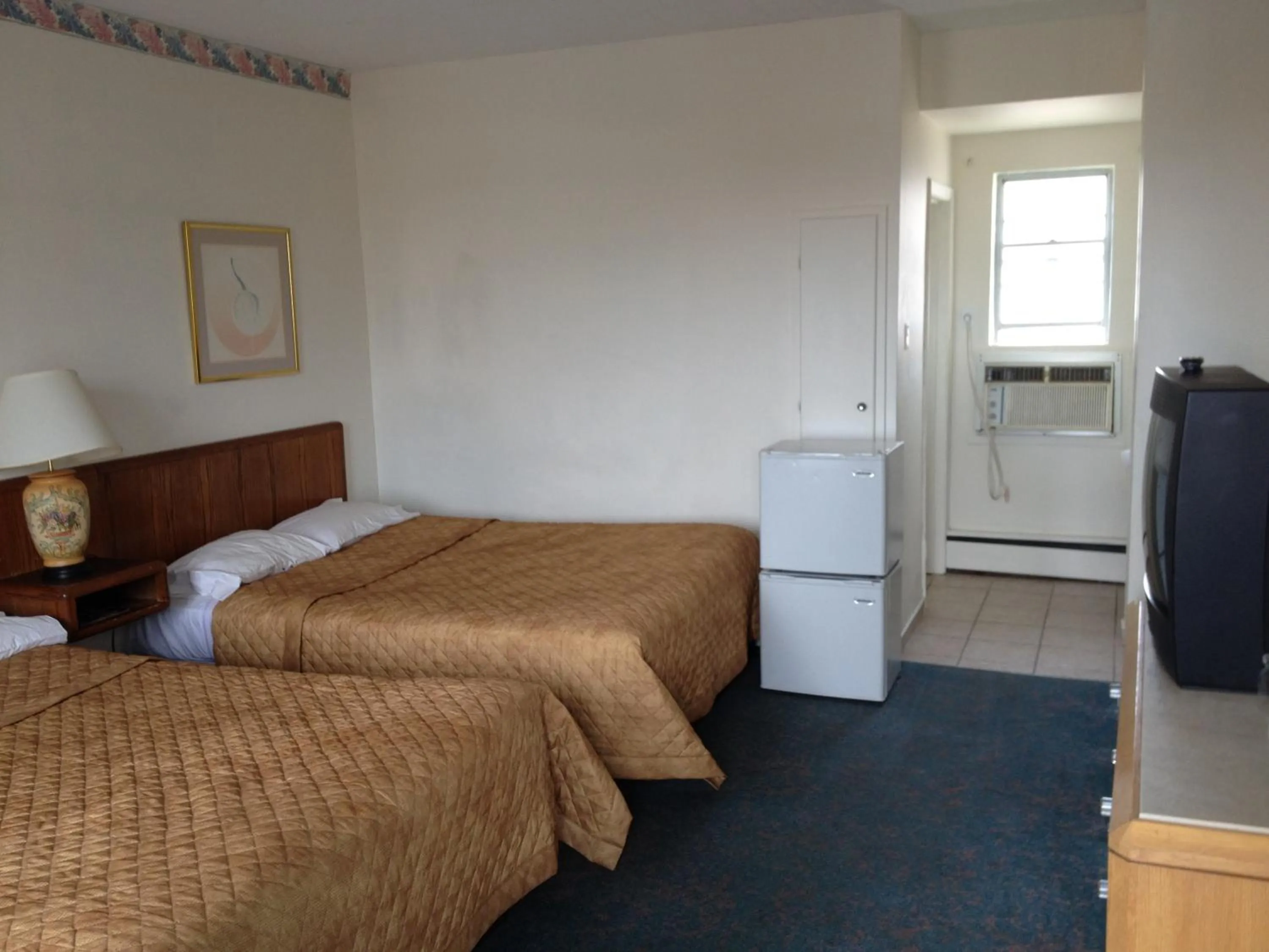 Bedroom, Bed in Rainbow Motor Inn - Fallsview